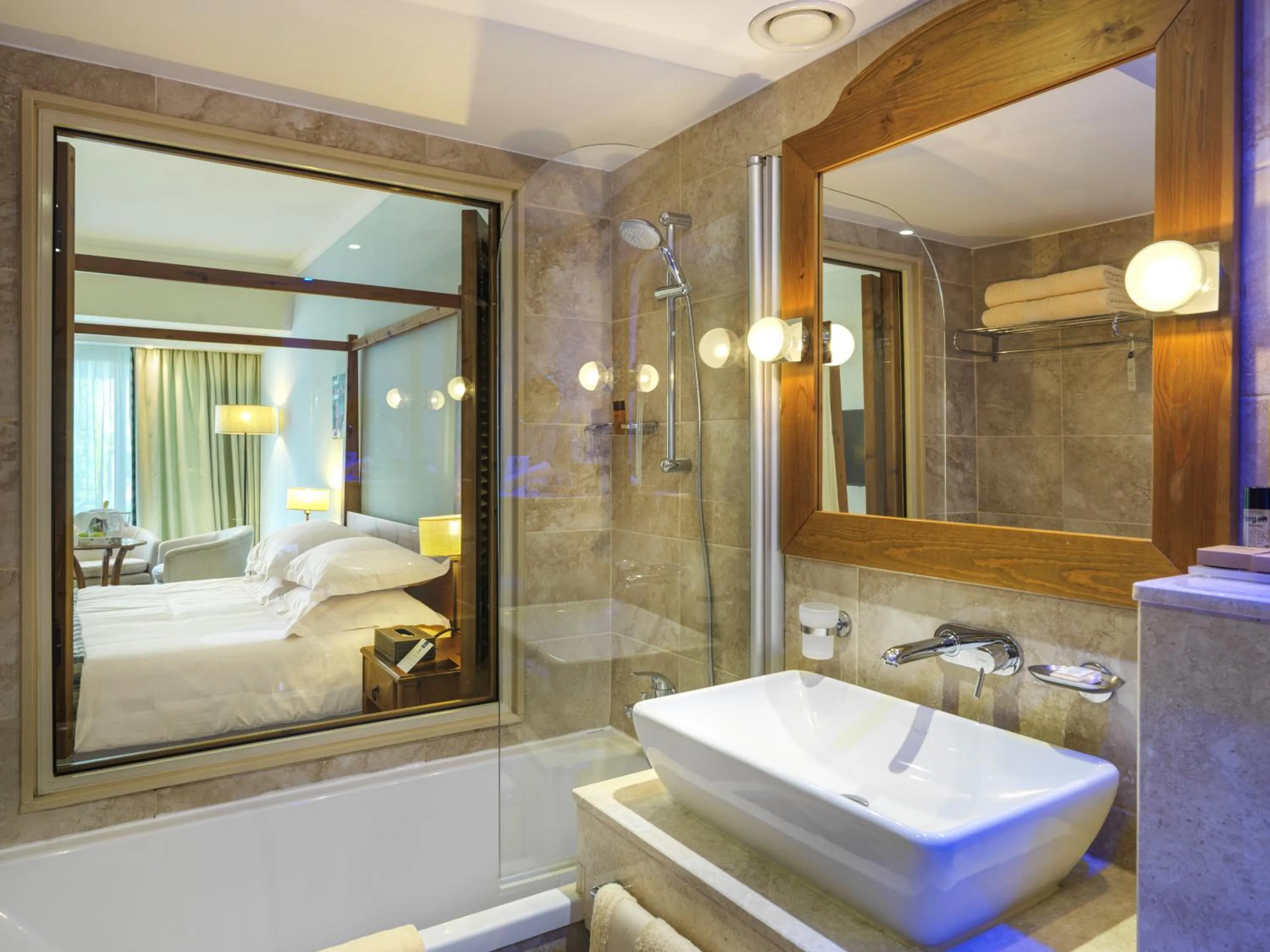 Bathroom, Bed in Olympic Lagoon Resort Paphos