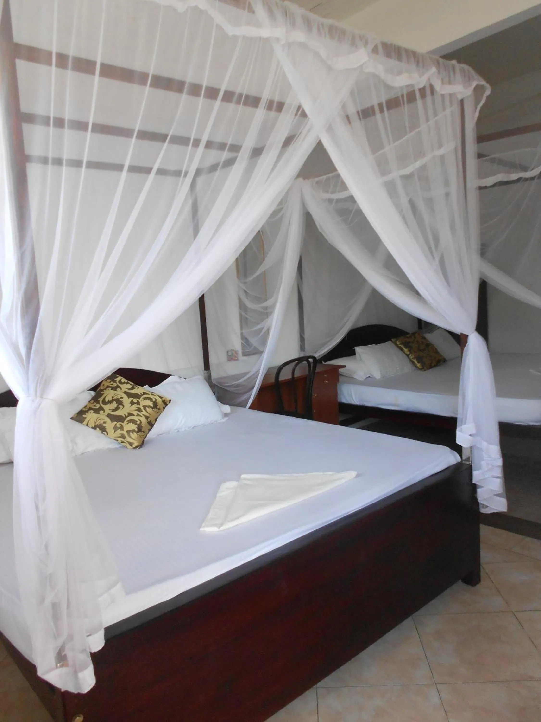 Bed in Wijenayake's - Beach Haven Guest House - Galle Fort