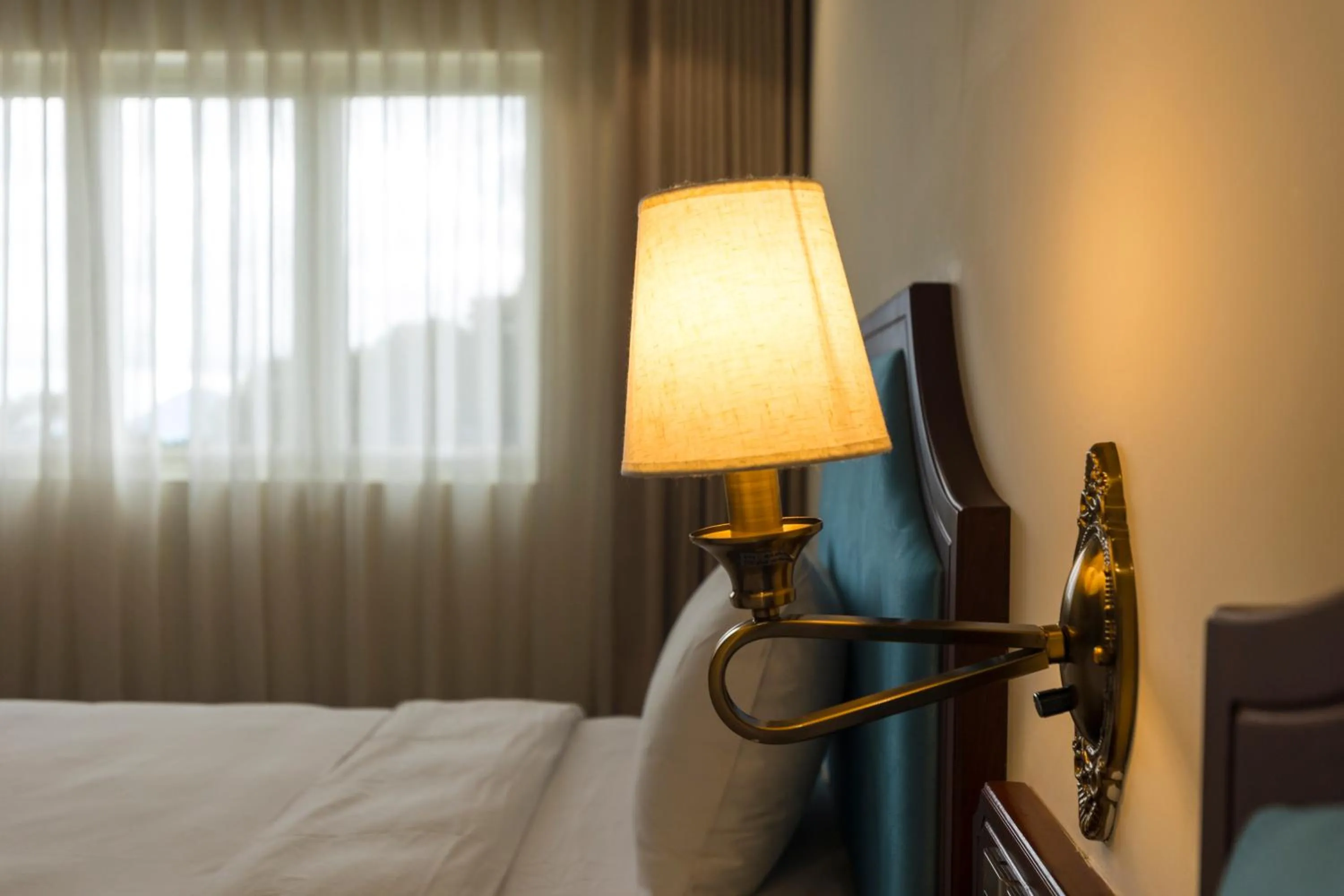 Bed in CALYSSA HOTELS & VILLAGE