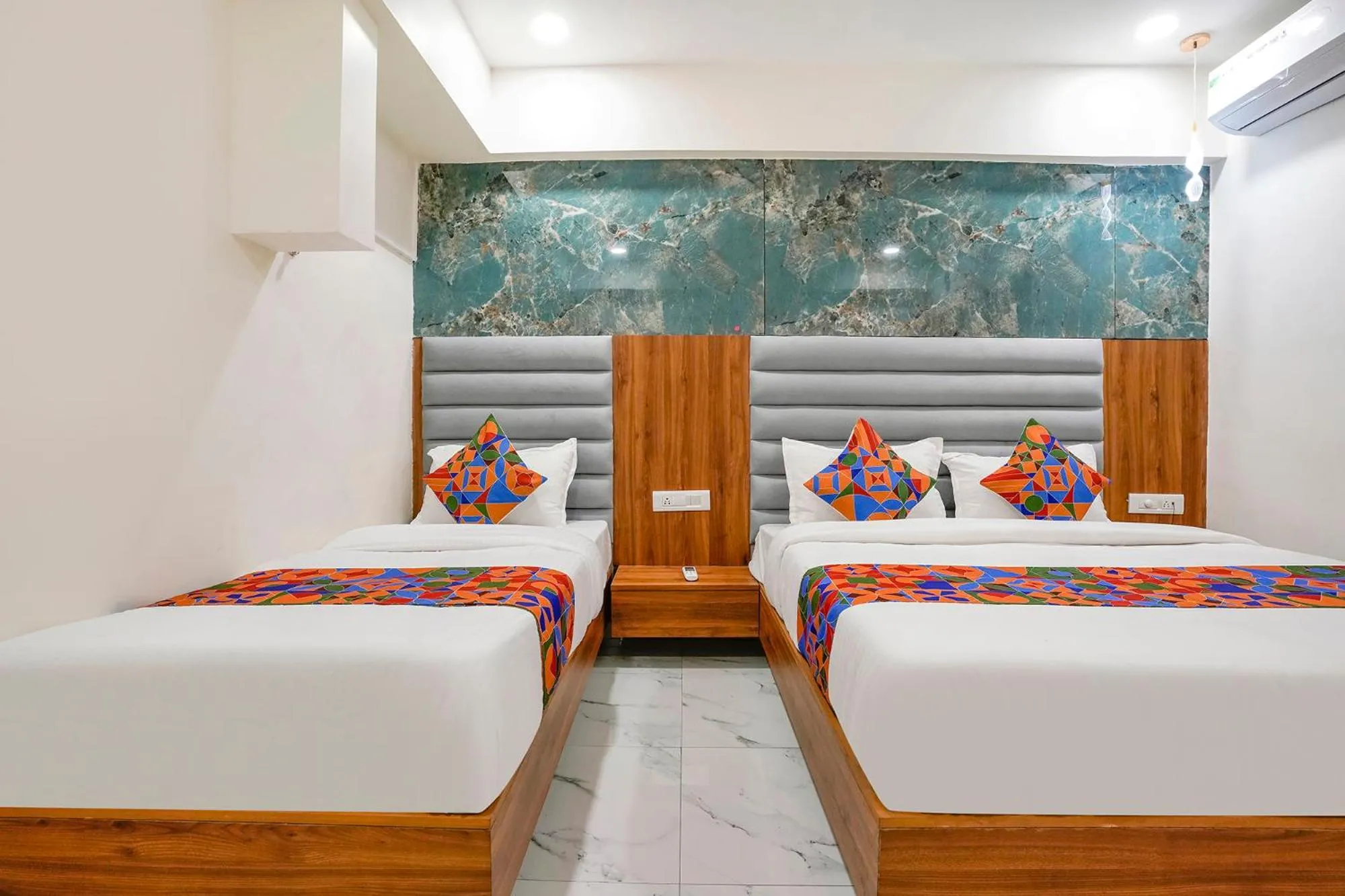 Bed in FabHotel Namantra - Nr Apollo Circle Sardar Patel Ring Road