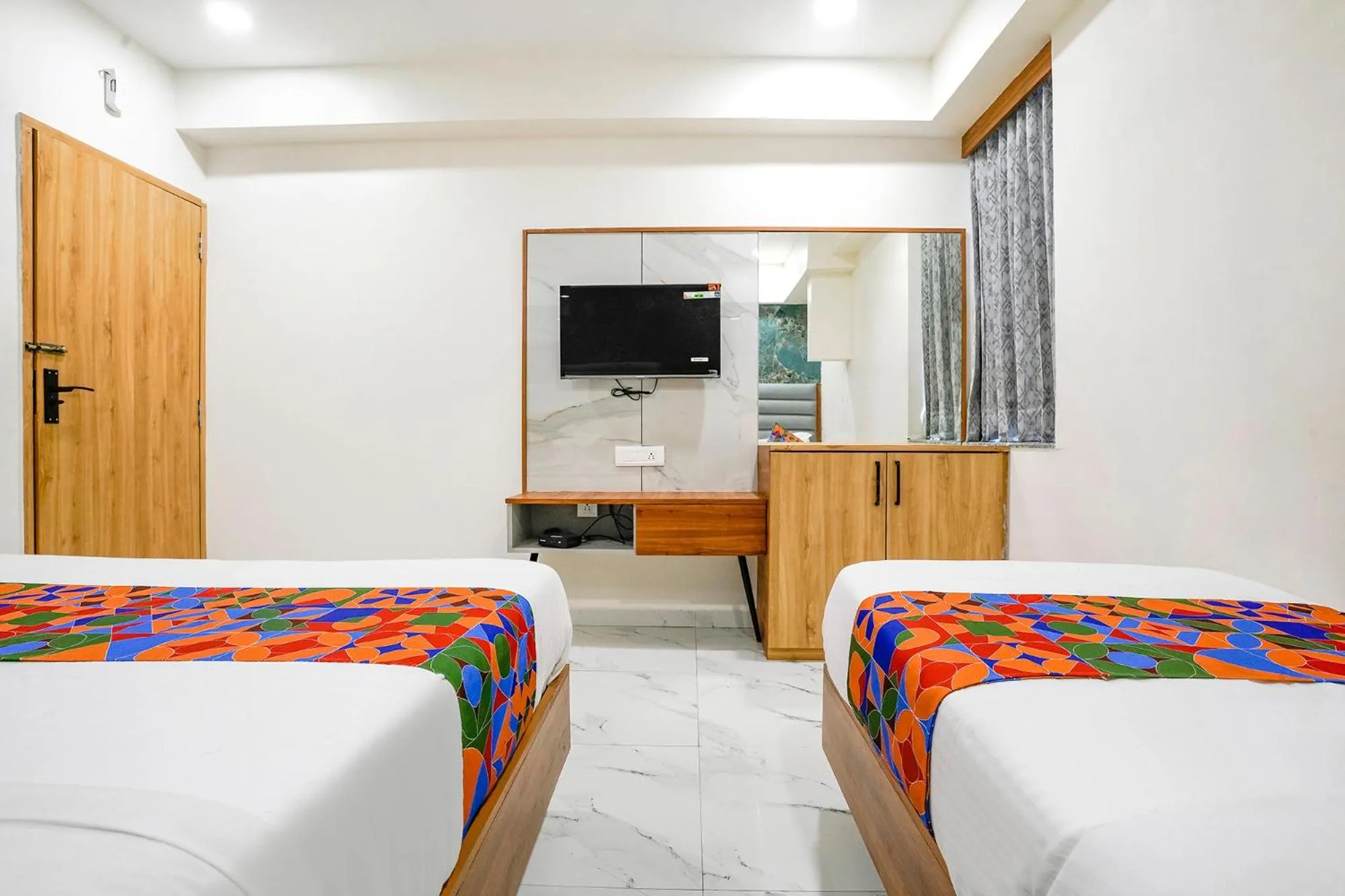 Bed in FabHotel Namantra - Nr Apollo Circle Sardar Patel Ring Road