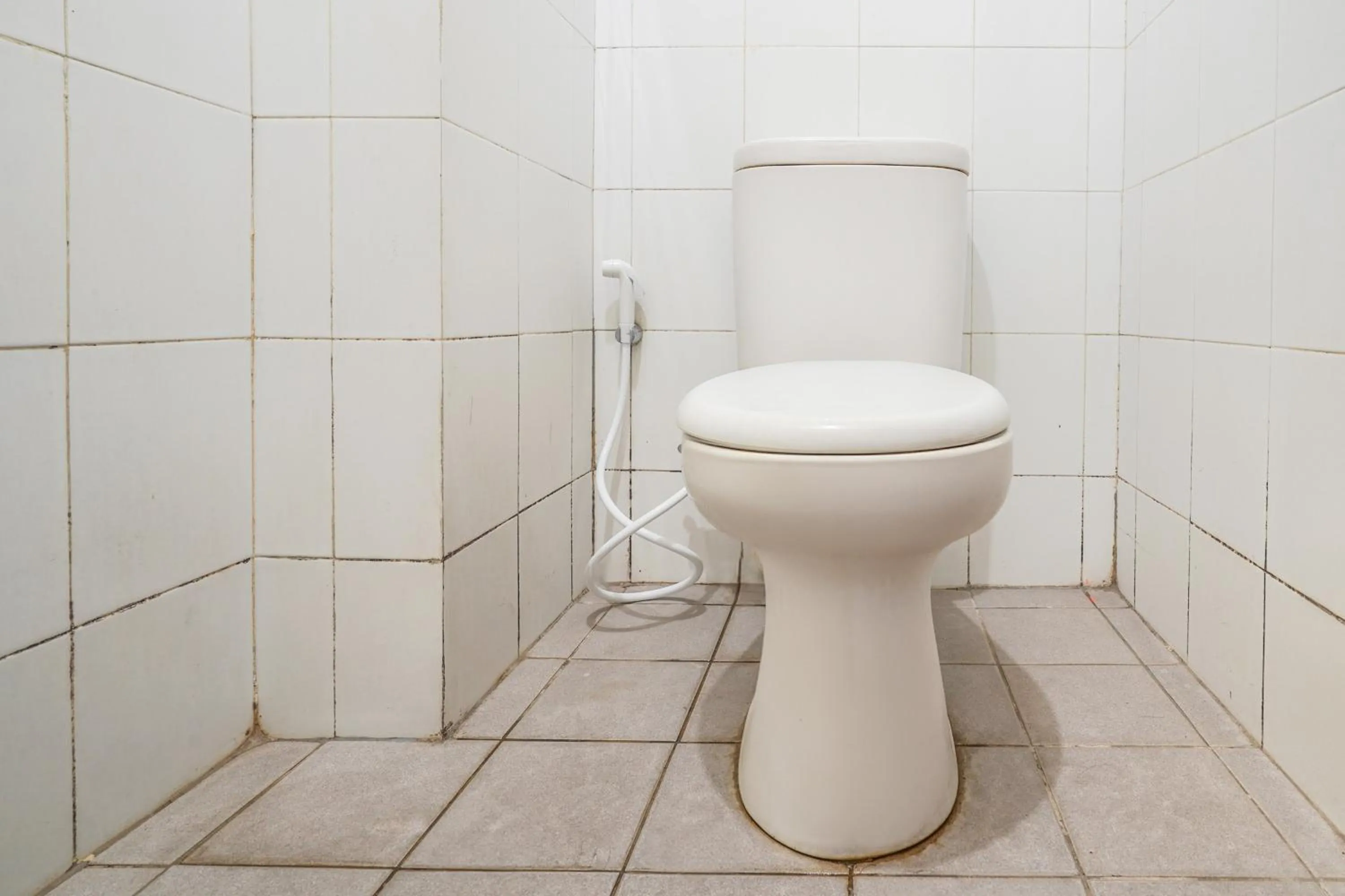 Bathroom in OYO 93545 Gateway Cicadas Apartment By Barbie Homestay