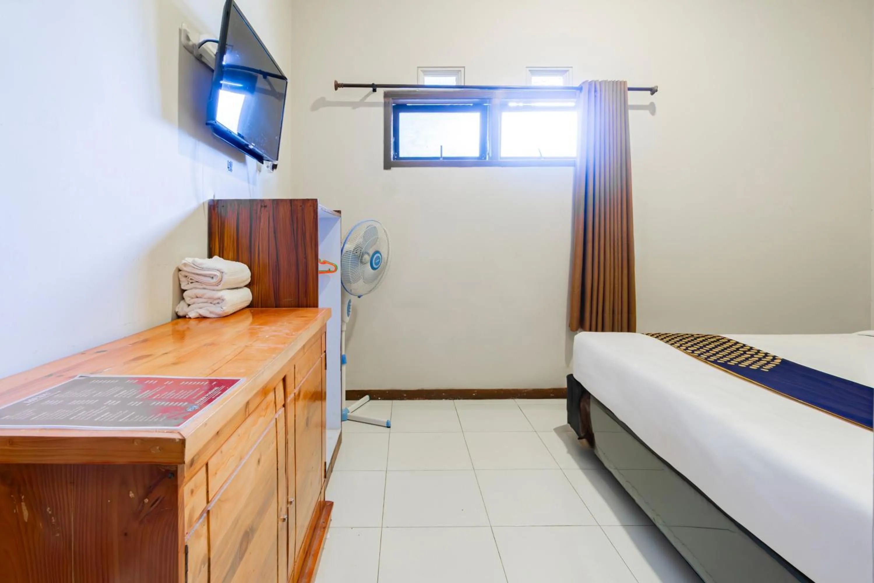 Bedroom, Bed in Hotel O Triple N Homestay