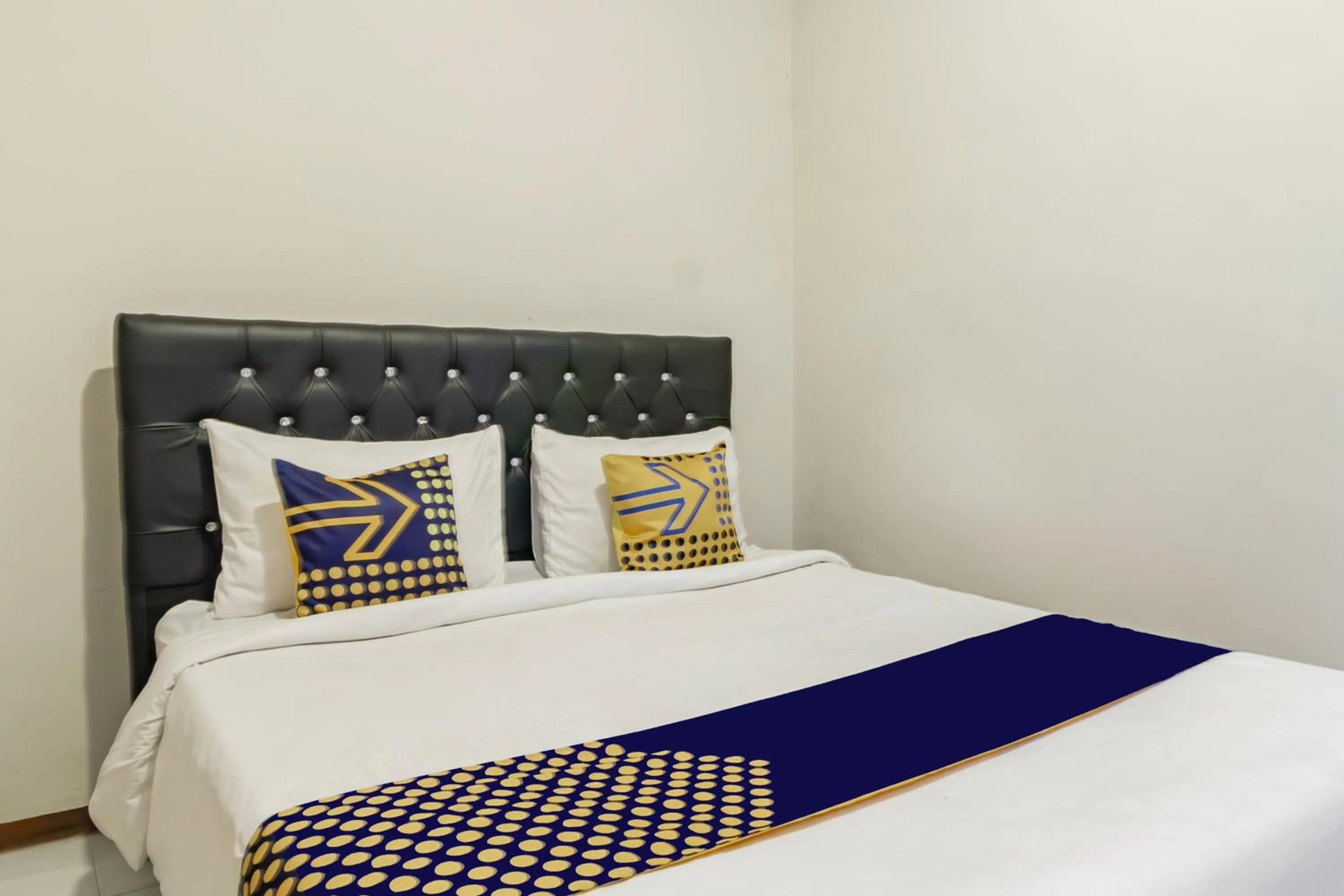 Bedroom, Bed in Hotel O Triple N Homestay