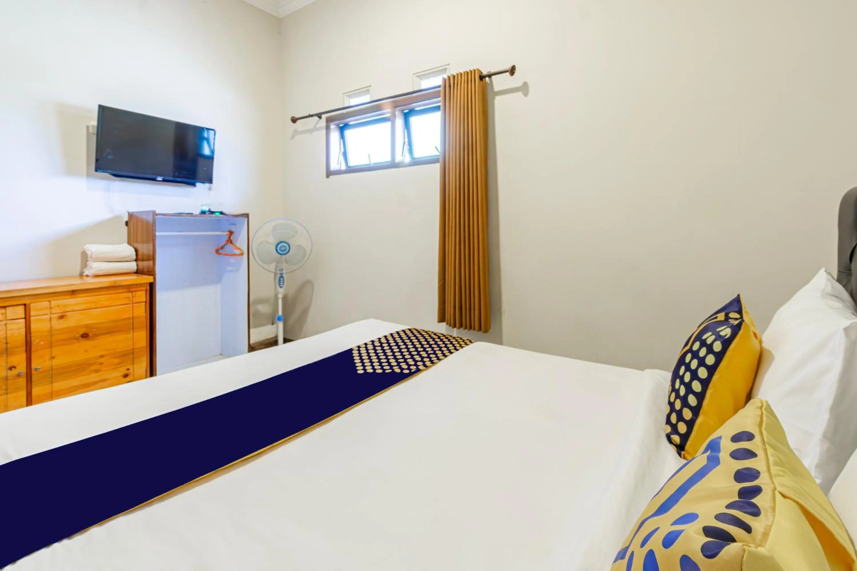 Bedroom, Bed in Hotel O Triple N Homestay