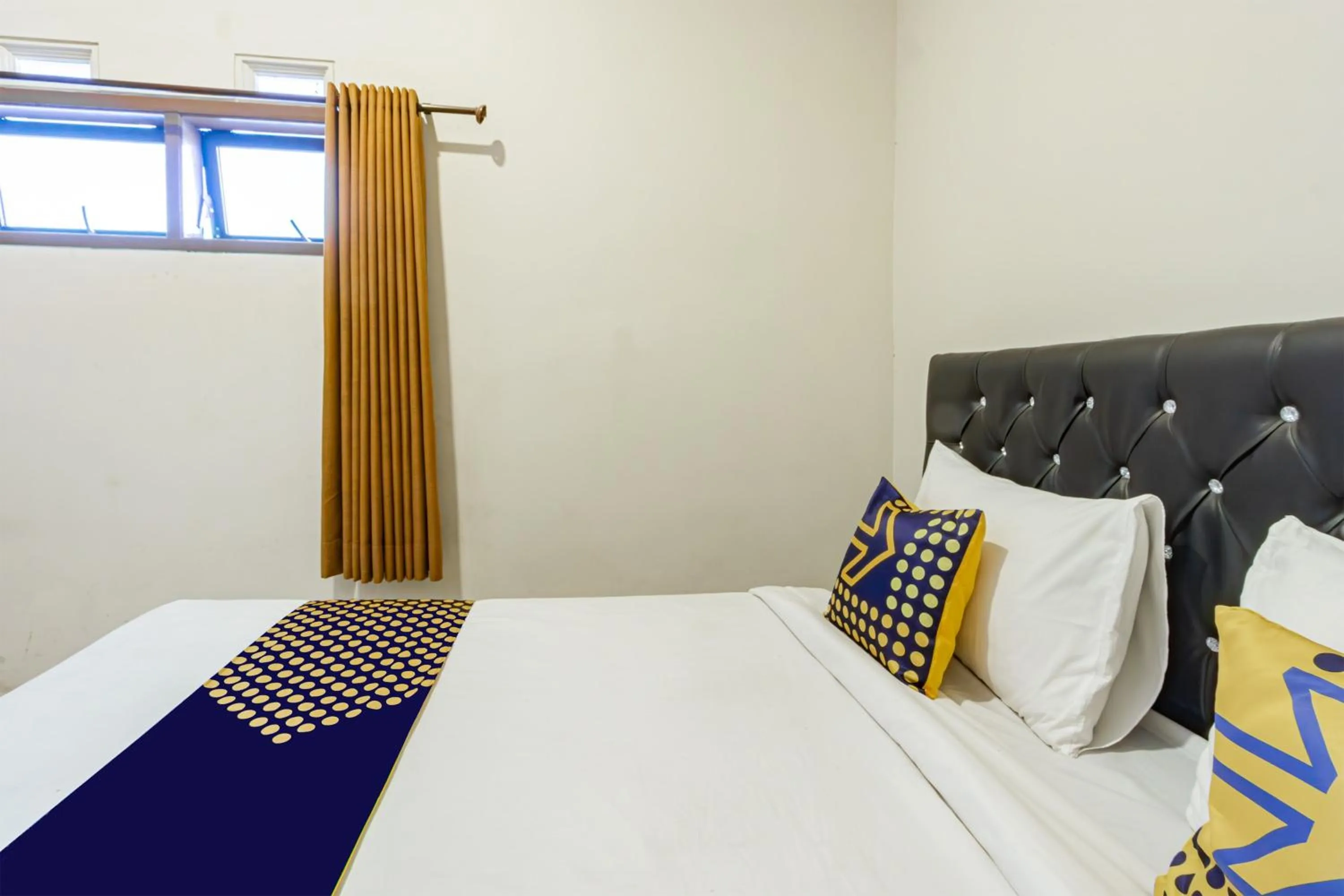 Bedroom, Bed in Hotel O Triple N Homestay