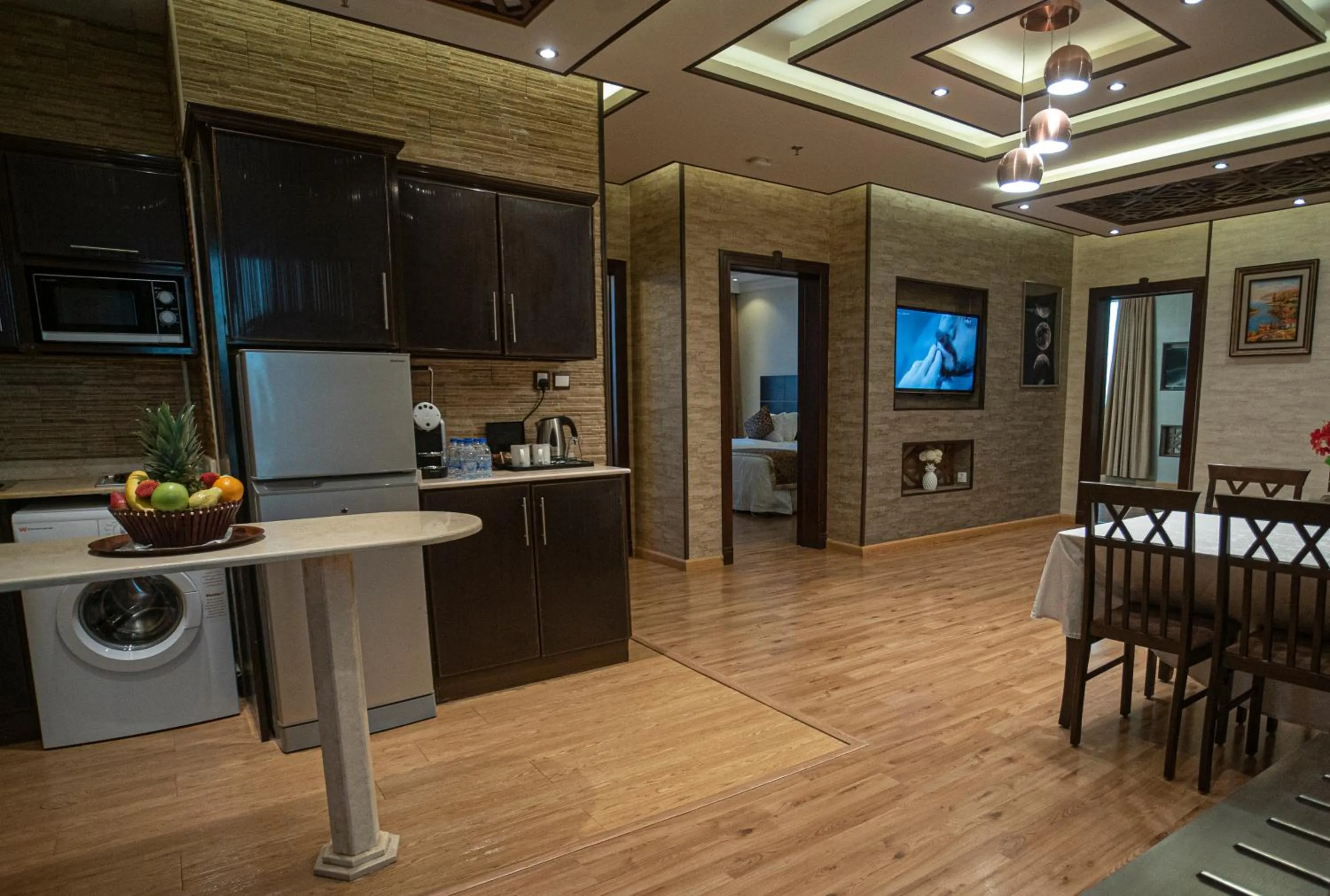 Kitchen or kitchenette in شقق بلاتينيوم السبعين للشقق المخدومة