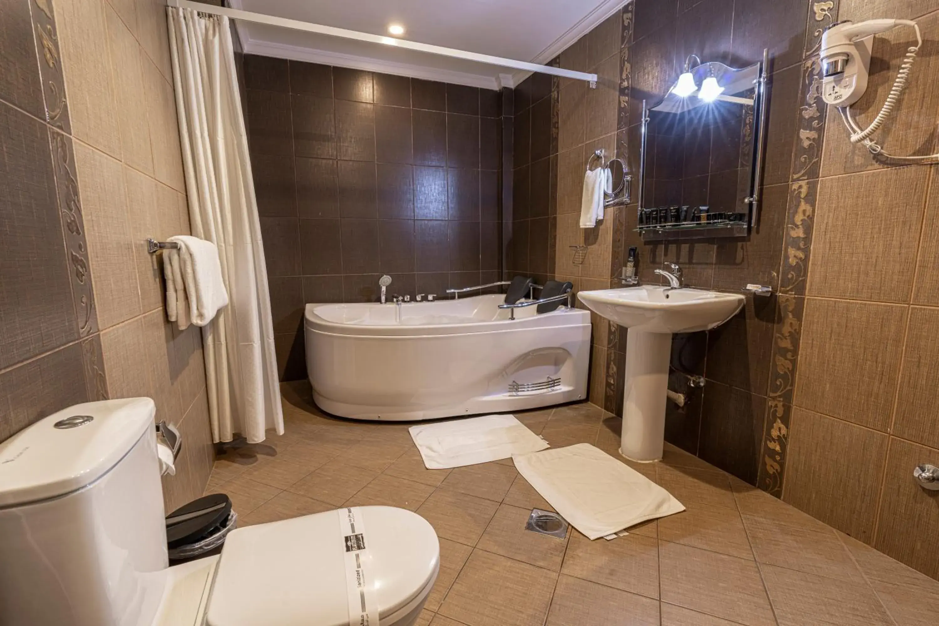 Bathroom in شقق بلاتينيوم السبعين للشقق المخدومة Bathroom in شقق بلاتينيوم السبعين للشقق المخدومة