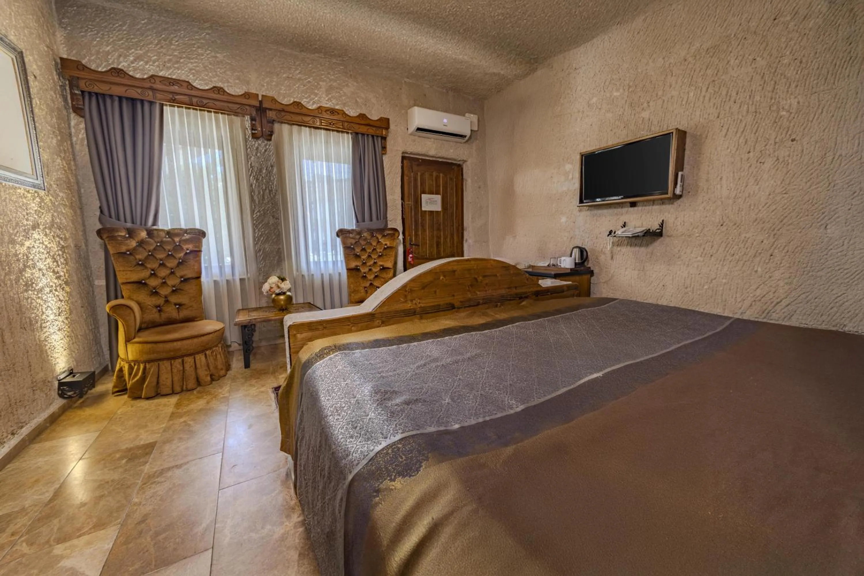 Bed in Cappadocia Inn Cave Hotel