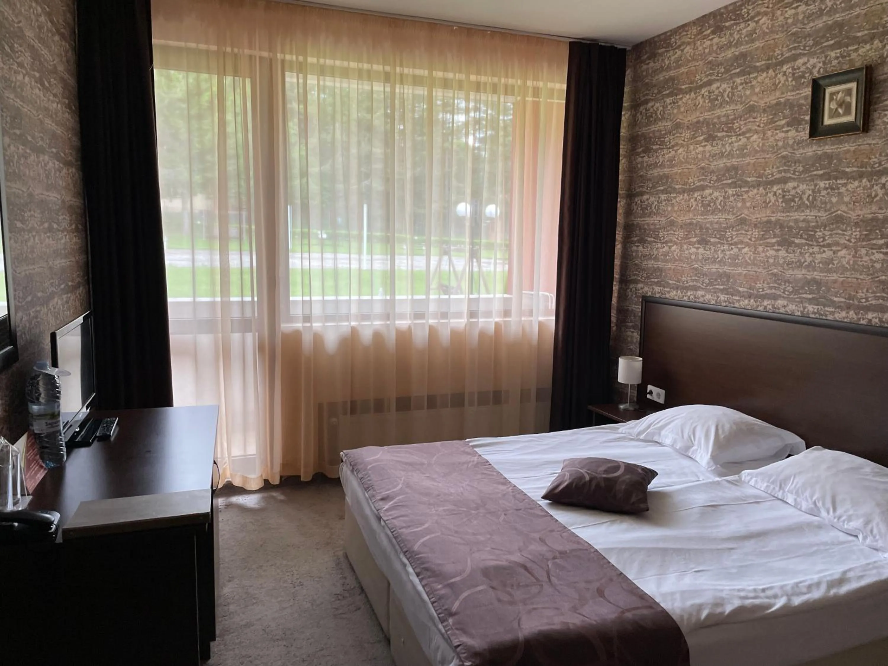 Property building, Bed in Paradise SPA Hotel