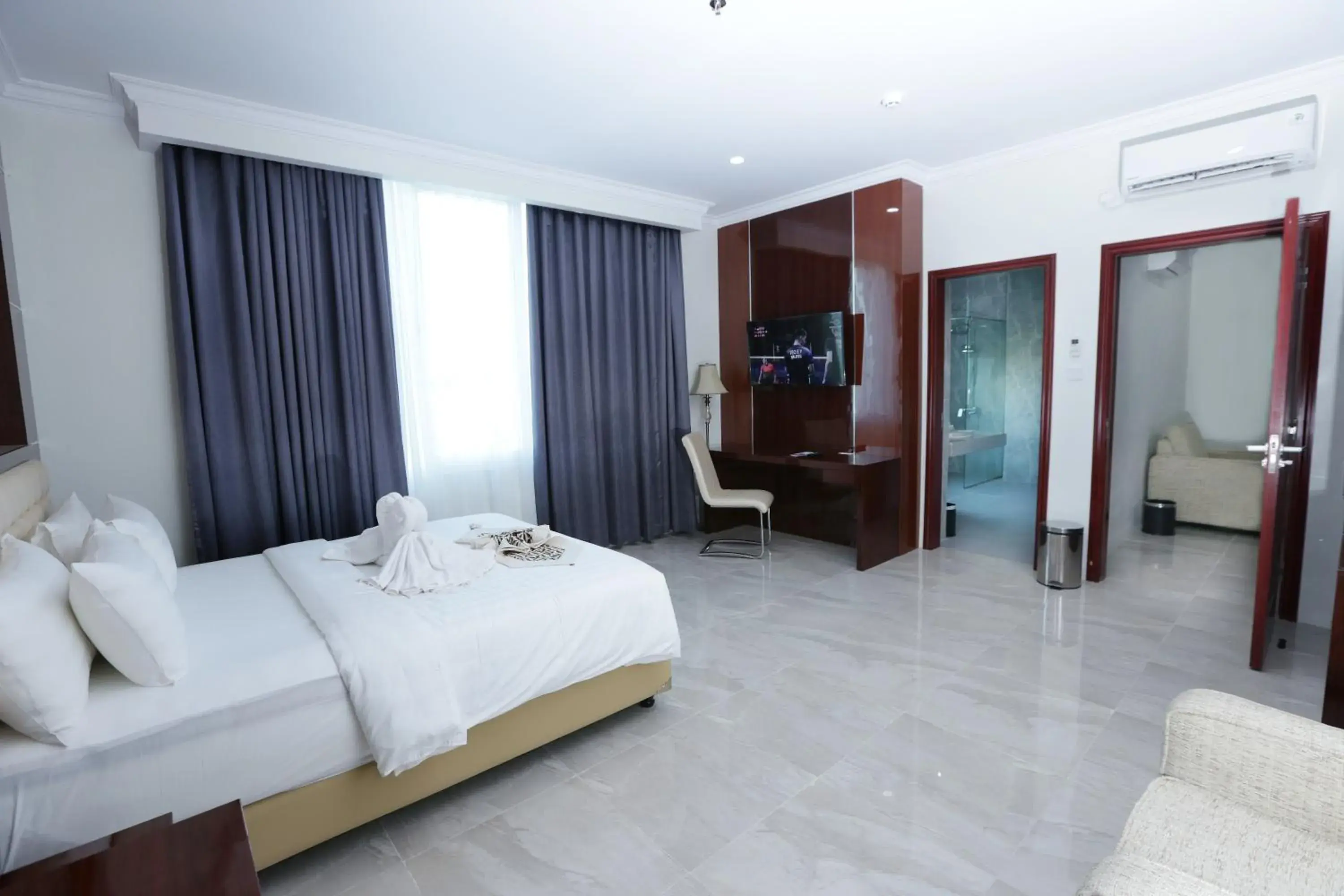 Bedroom in Sindoro Hotel Cilacap By Conary Bedroom in Sindoro Hotel Cilacap By Conary