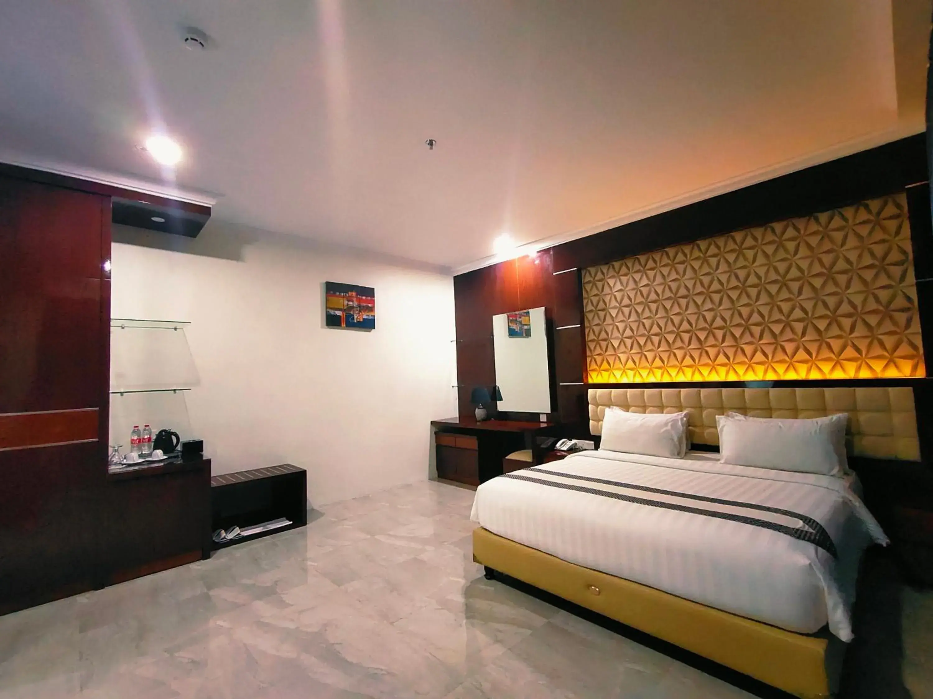 Bedroom in Sindoro Hotel Cilacap By Conary Bedroom in Sindoro Hotel Cilacap By Conary