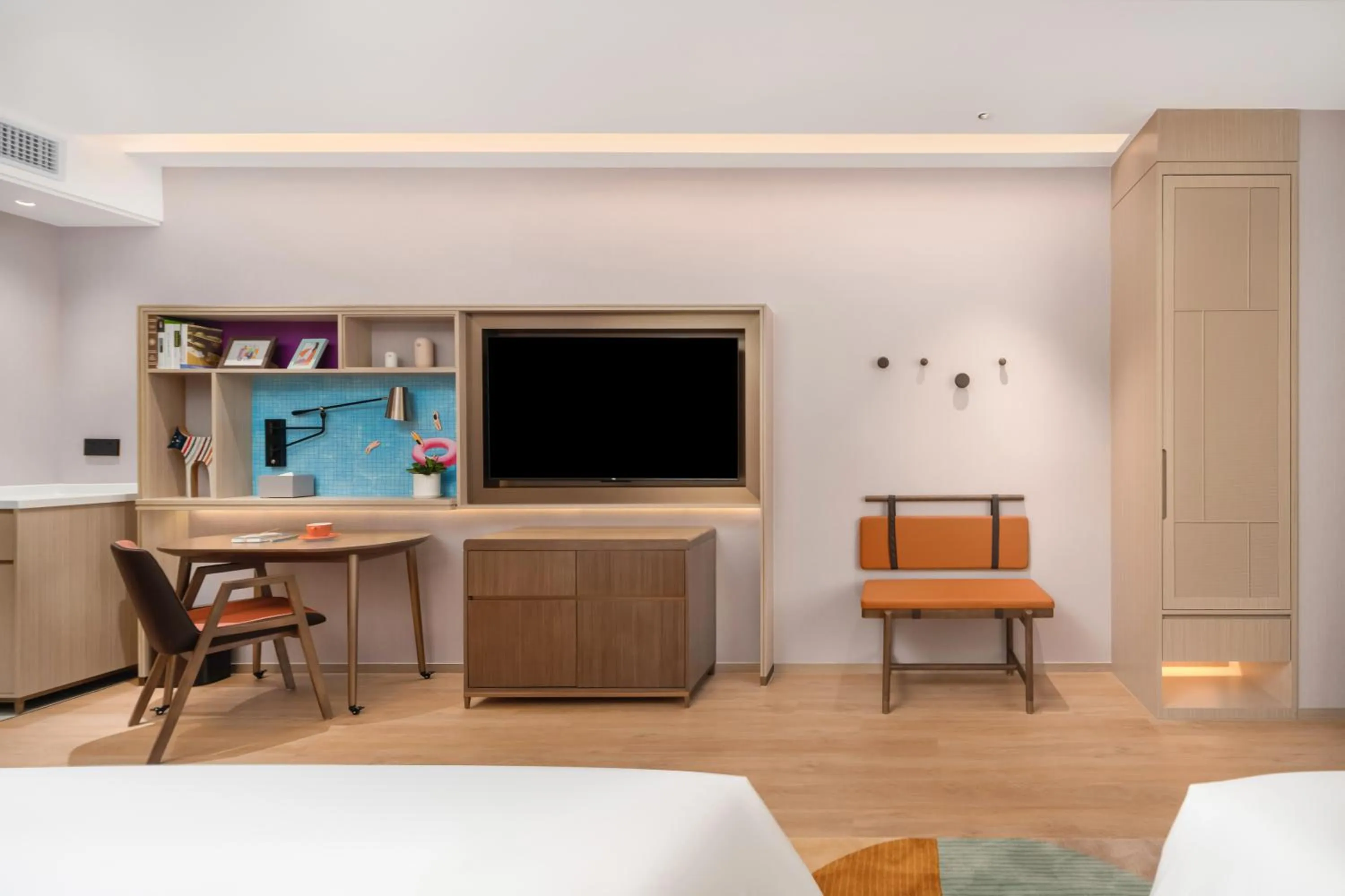 Bed in Home2 Suite by Hilton Dongguan Shijie