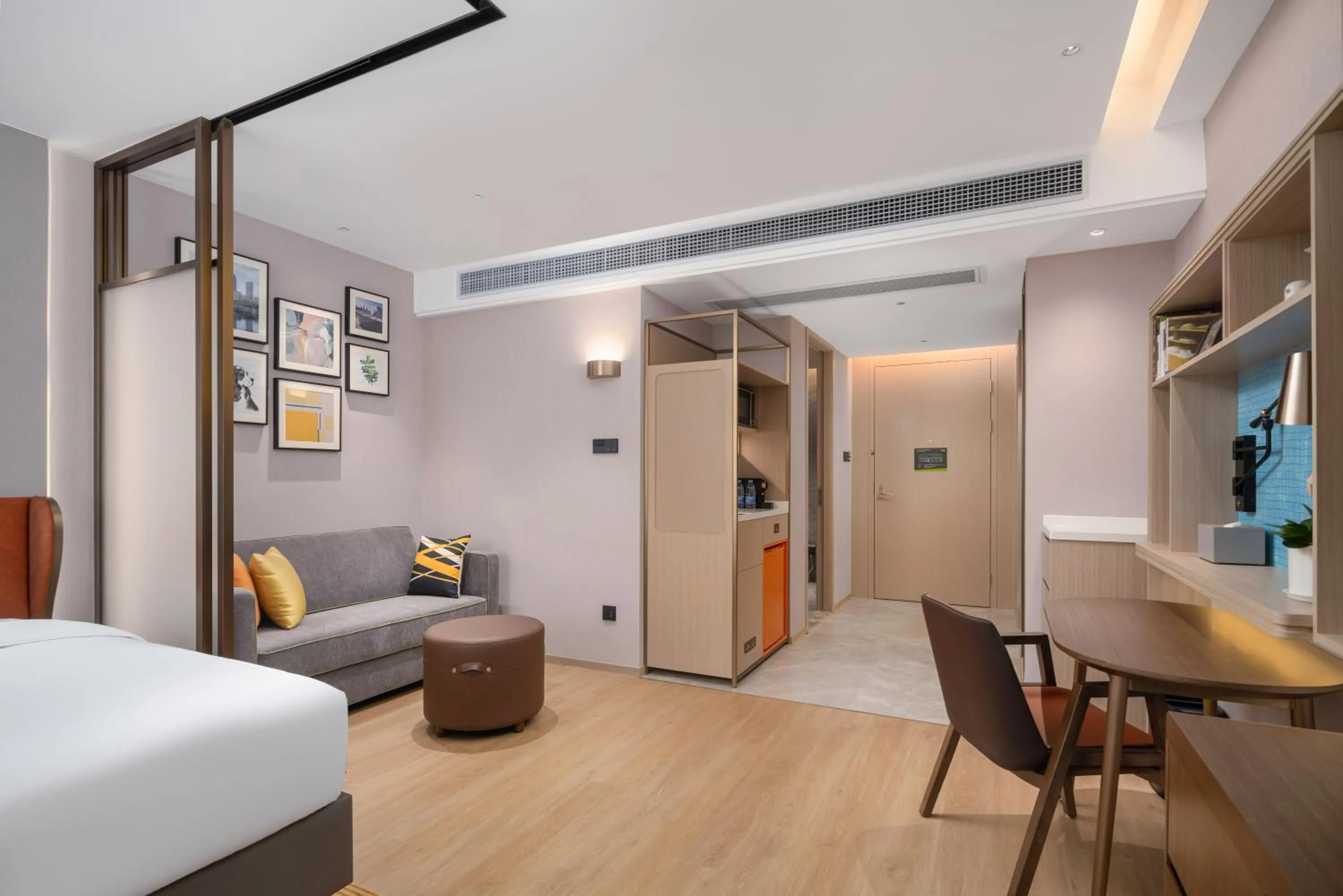 Bed in Home2 Suite by Hilton Dongguan Shijie