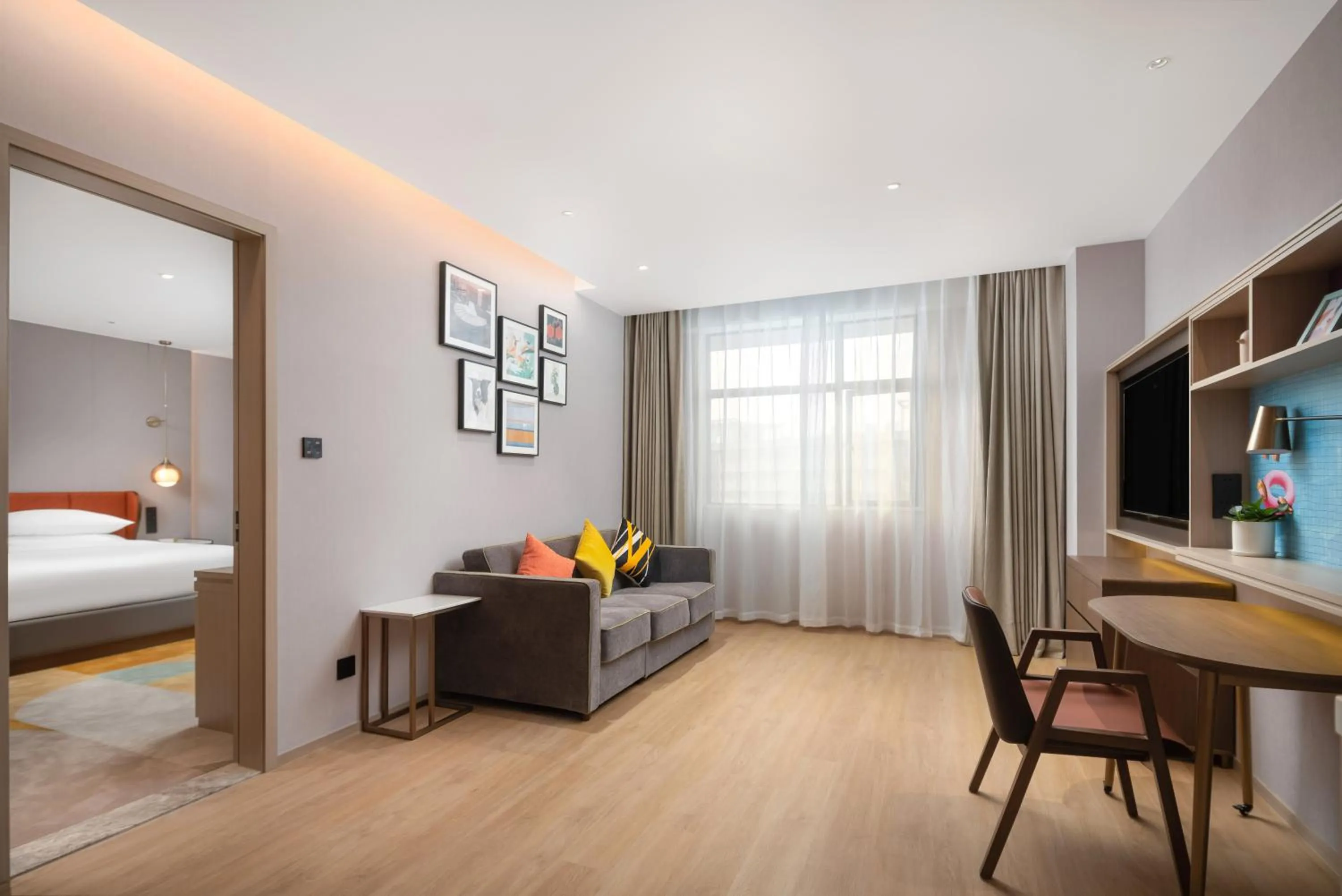 Bed in Home2 Suite by Hilton Dongguan Shijie