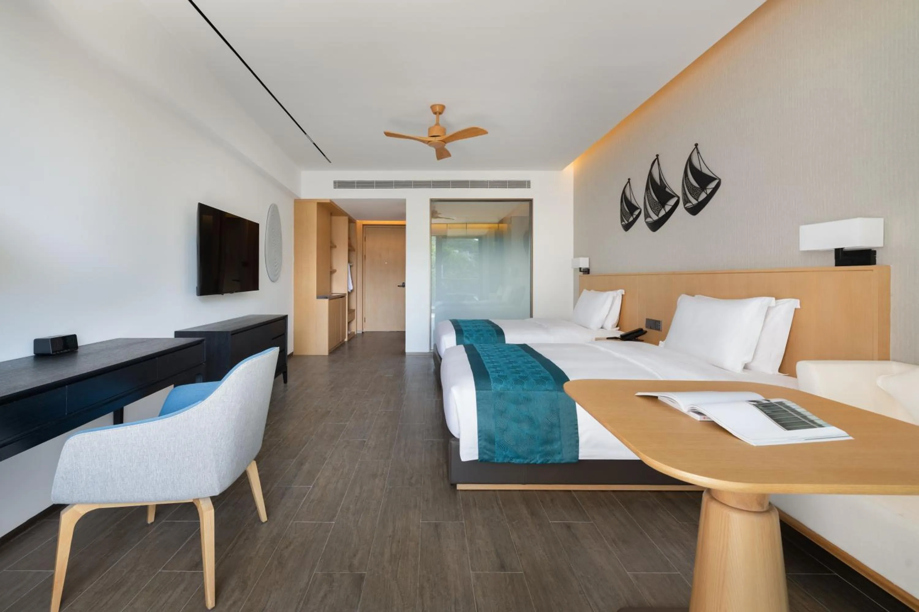 Photo of the whole room, Bed in Sanya Junji Seaview Hotel