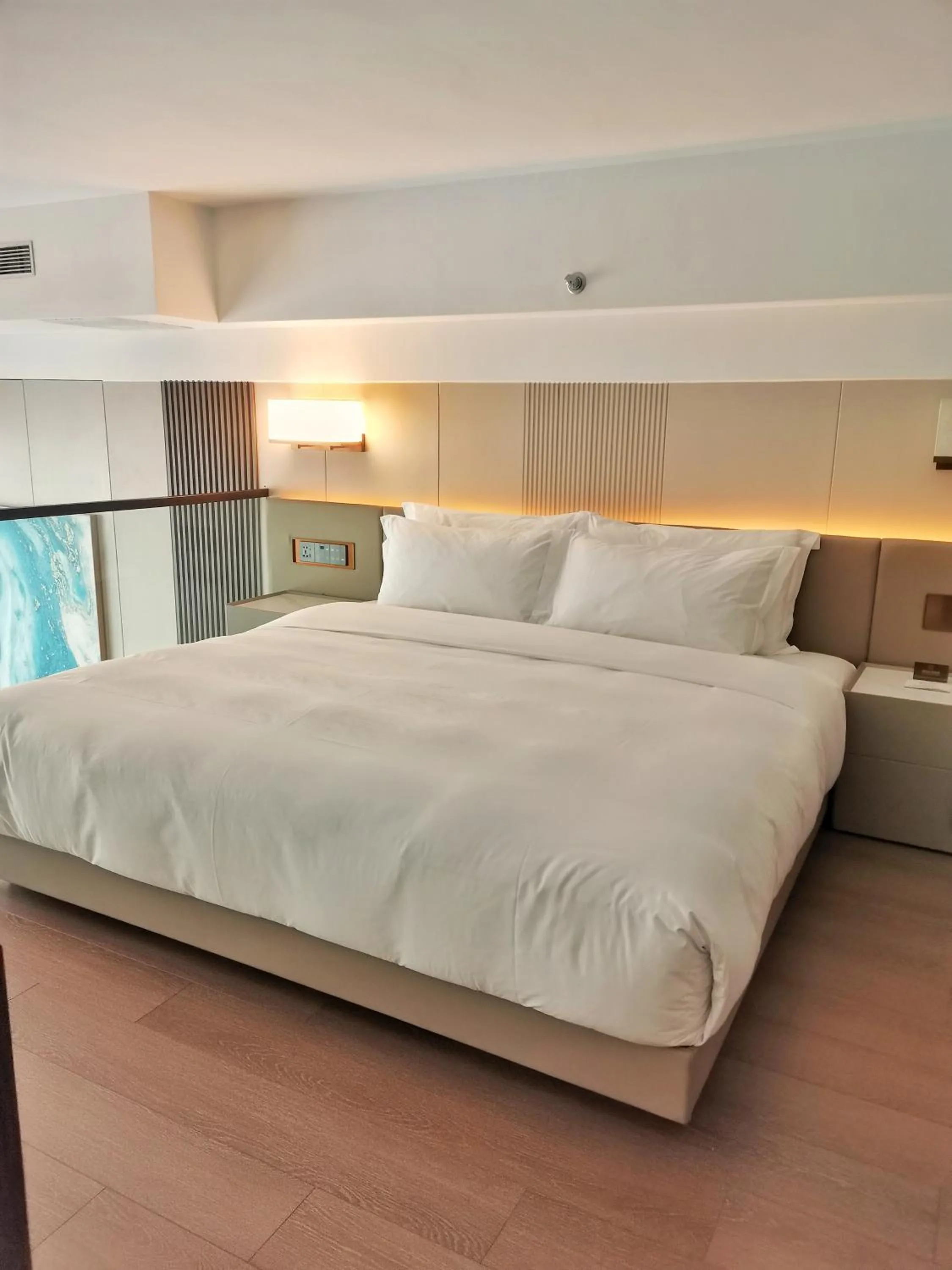 Bed in Wyndham Dalian Jinpu