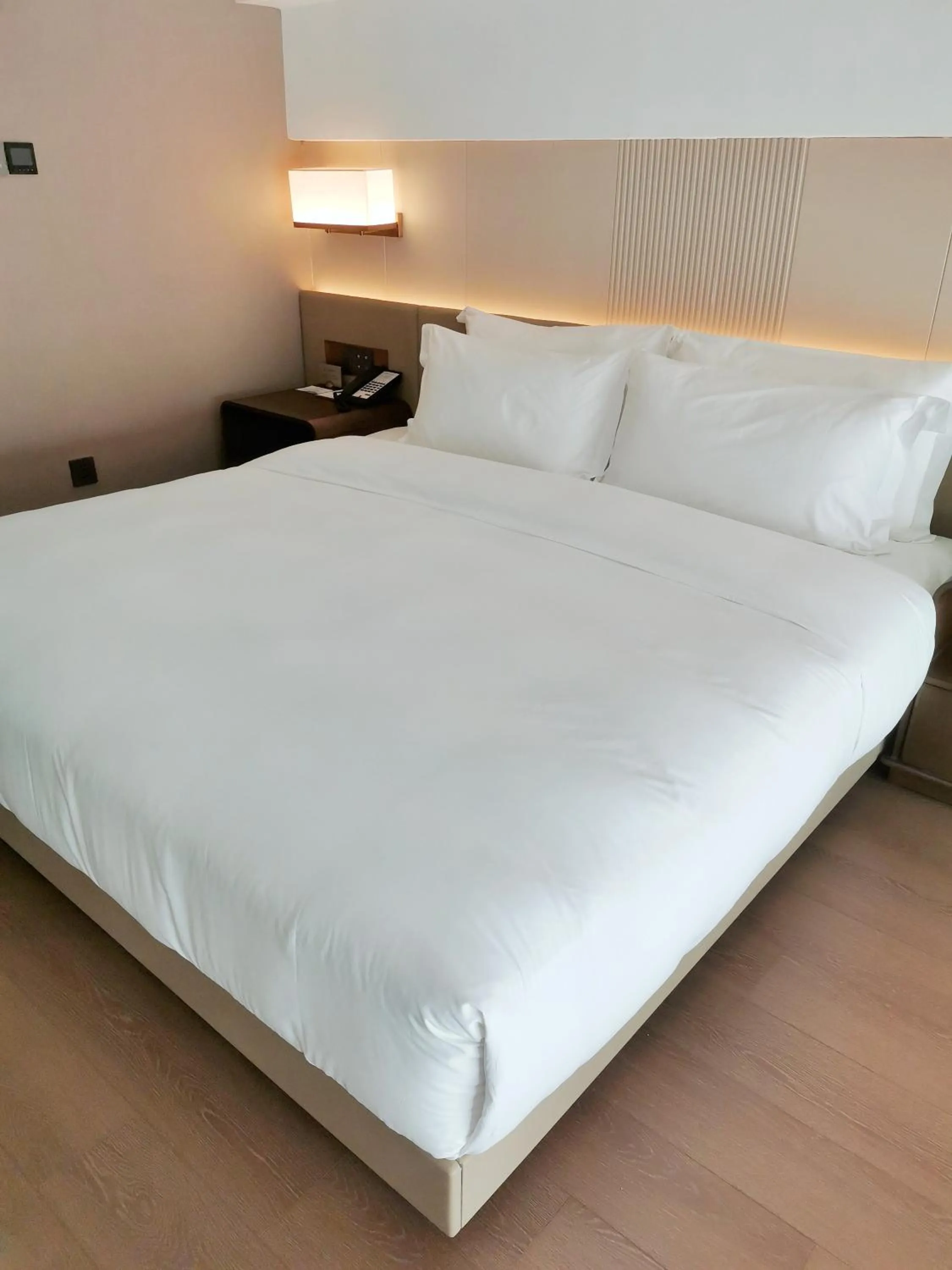 Bed in Wyndham Dalian Jinpu