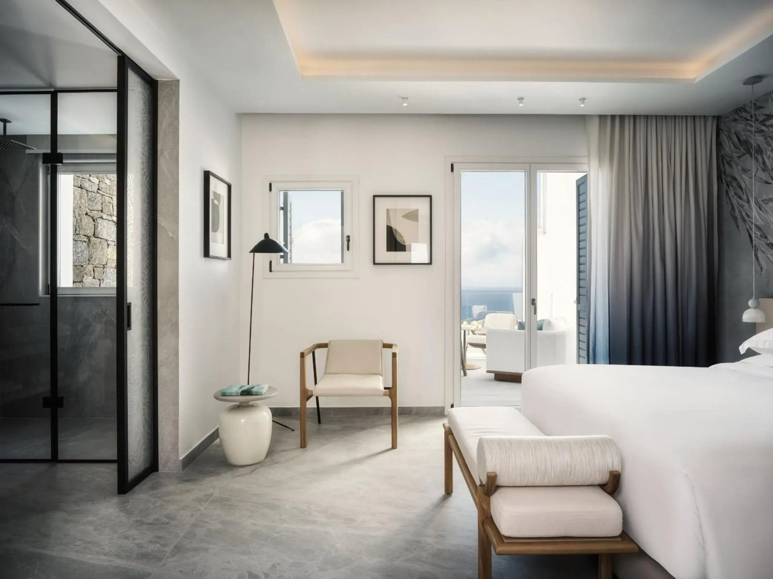 Bed in Deos Mykonos - A Myconian Collection Hotel Bed in Deos Mykonos - A Myconian Collection Hotel