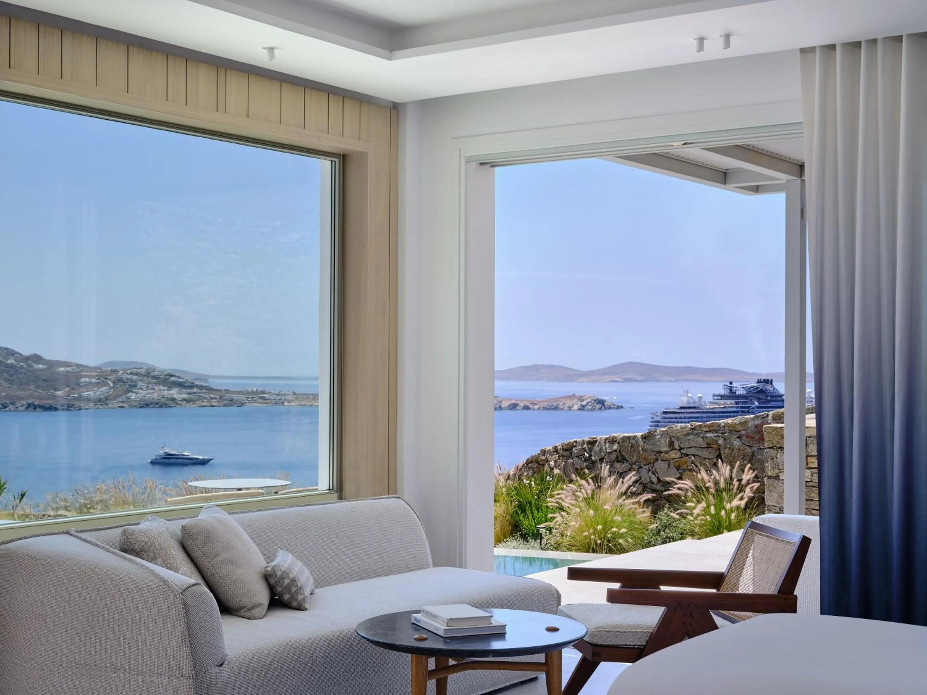 Living room in Deos Mykonos - A Myconian Collection Hotel