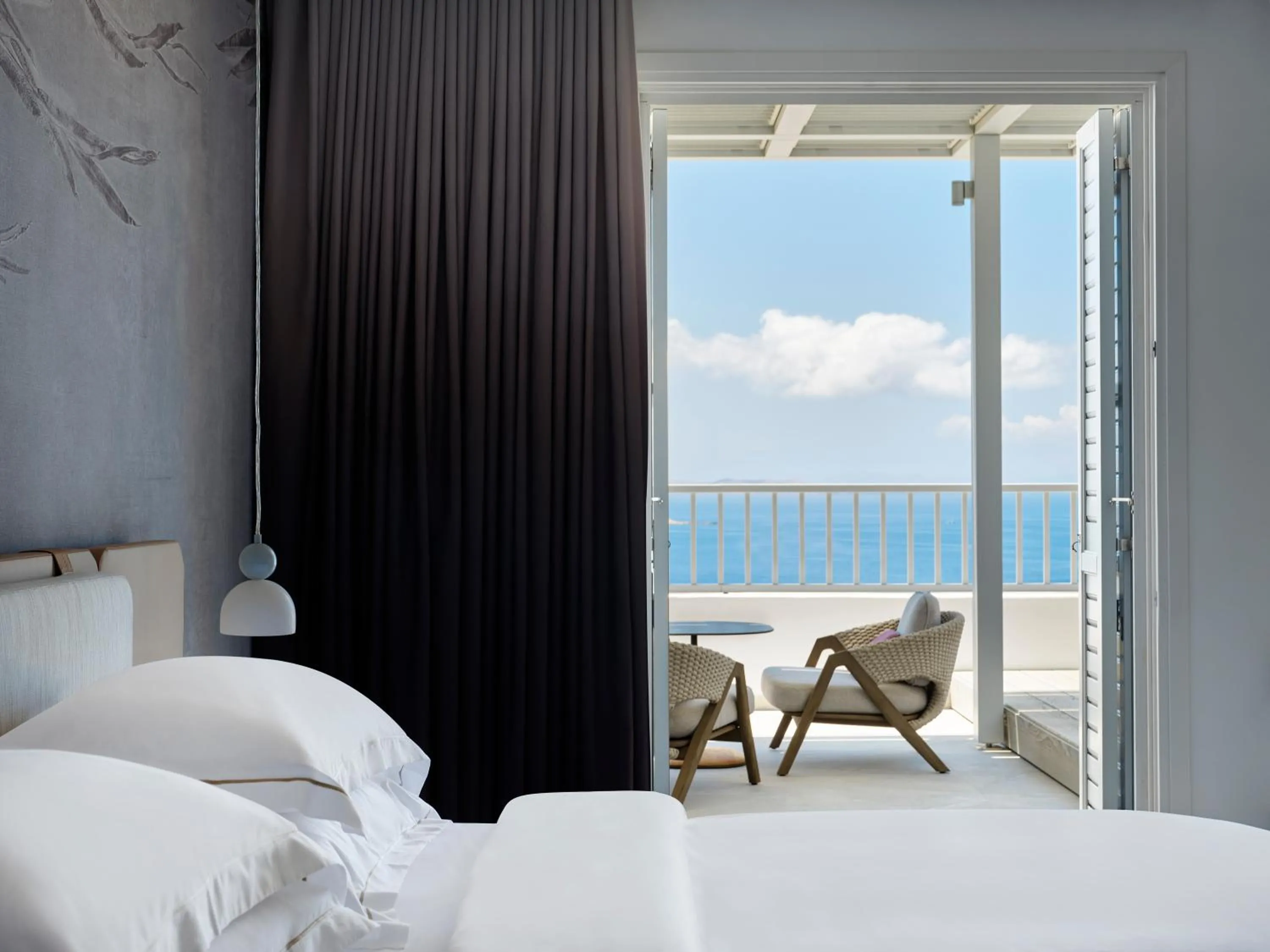 Bed in Deos Mykonos - A Myconian Collection Hotel