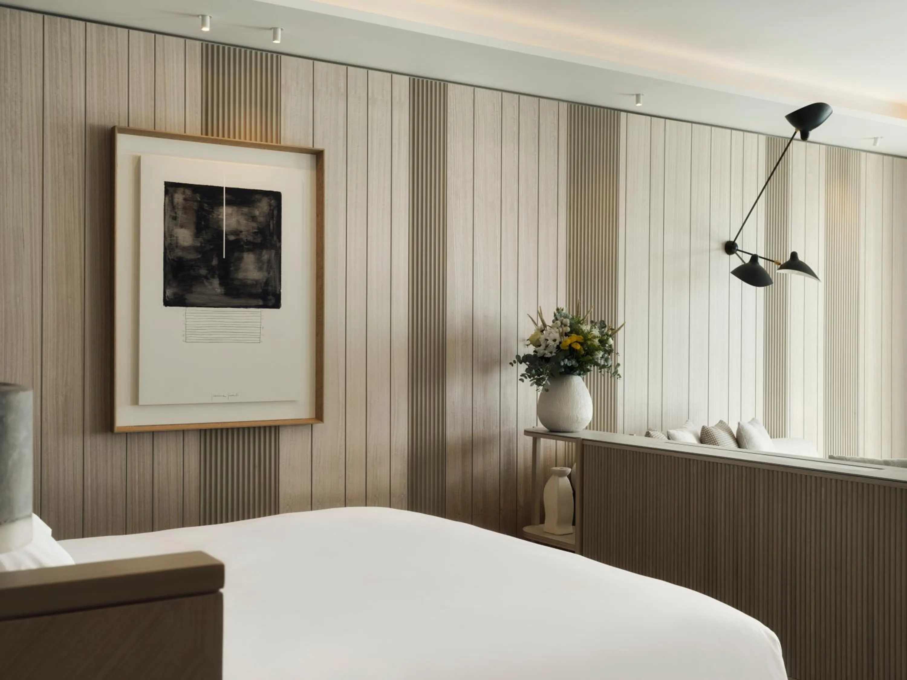 Bed in Deos Mykonos - A Myconian Collection Hotel