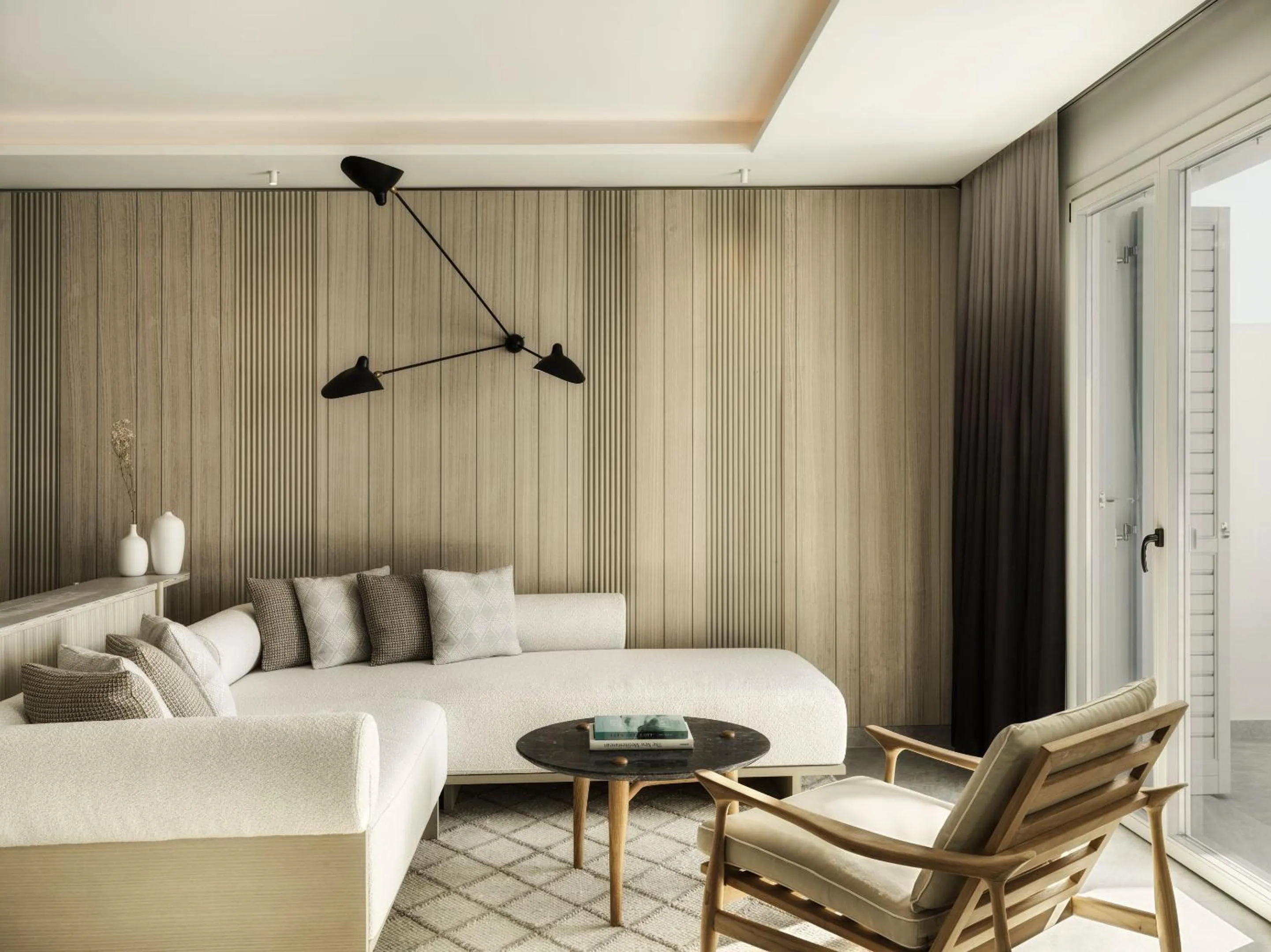 Living room in Deos Mykonos - A Myconian Collection Hotel