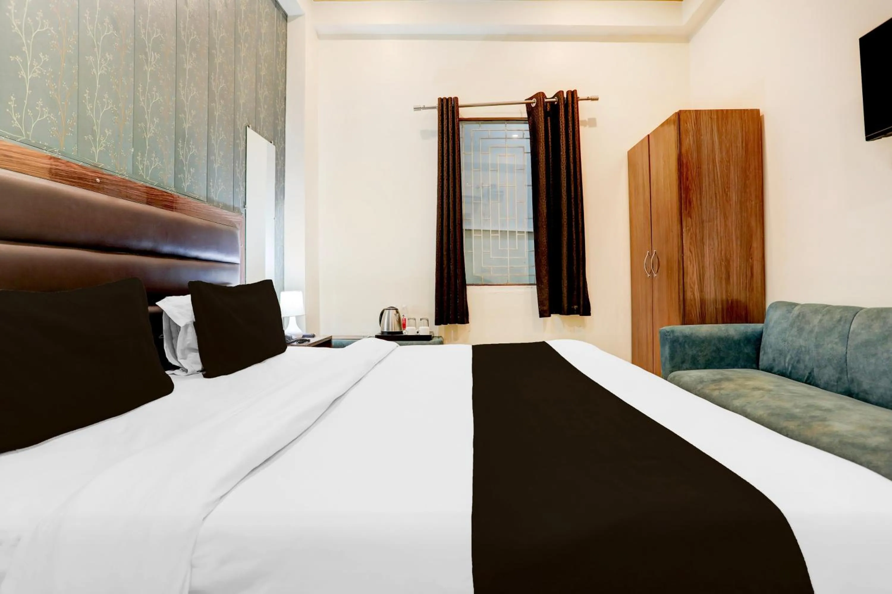 Bedroom, Bed in Super Hotel O Sankat Mochan Gandhi Nagar