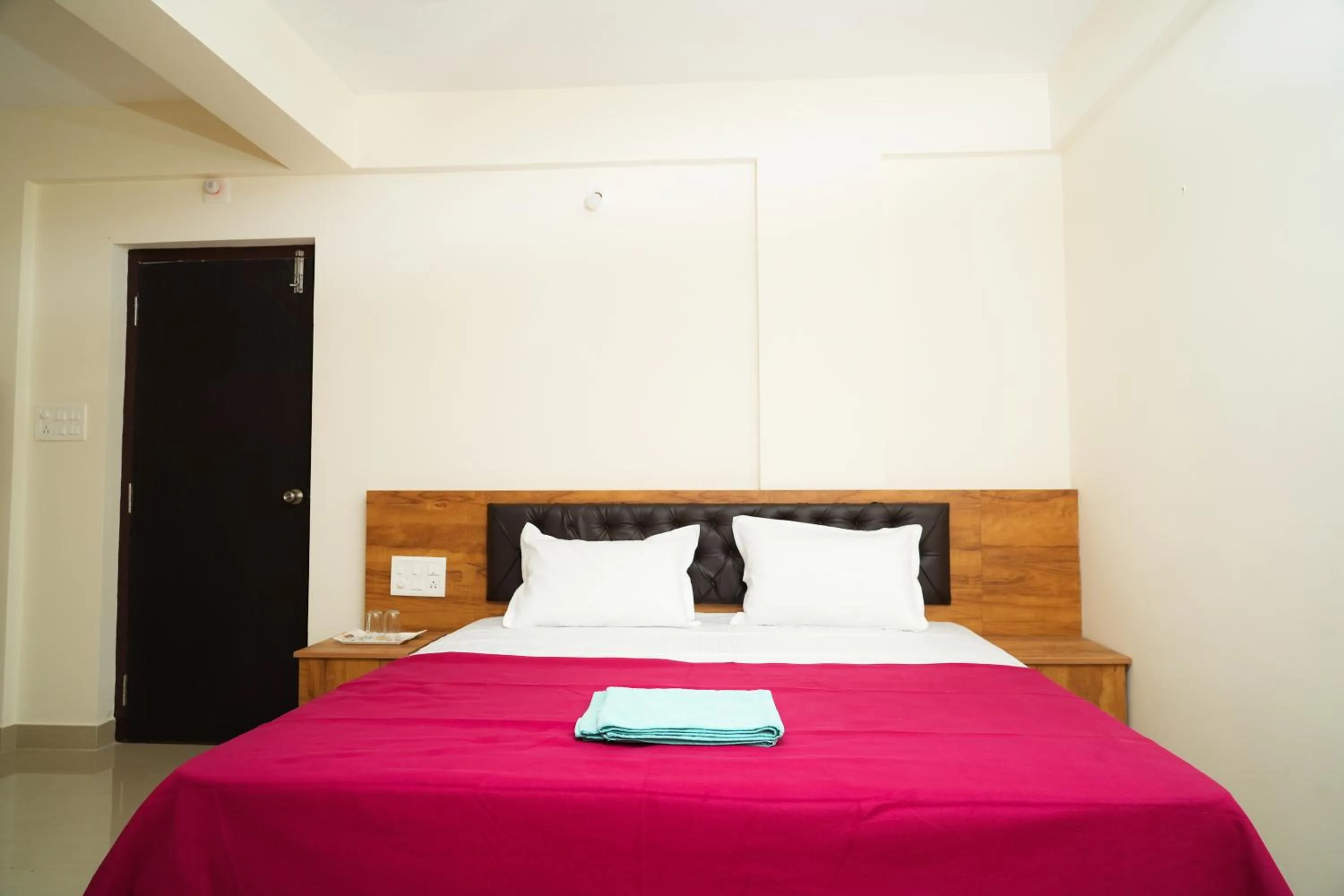 Bedroom, Bed in Shree Swarna Comforts