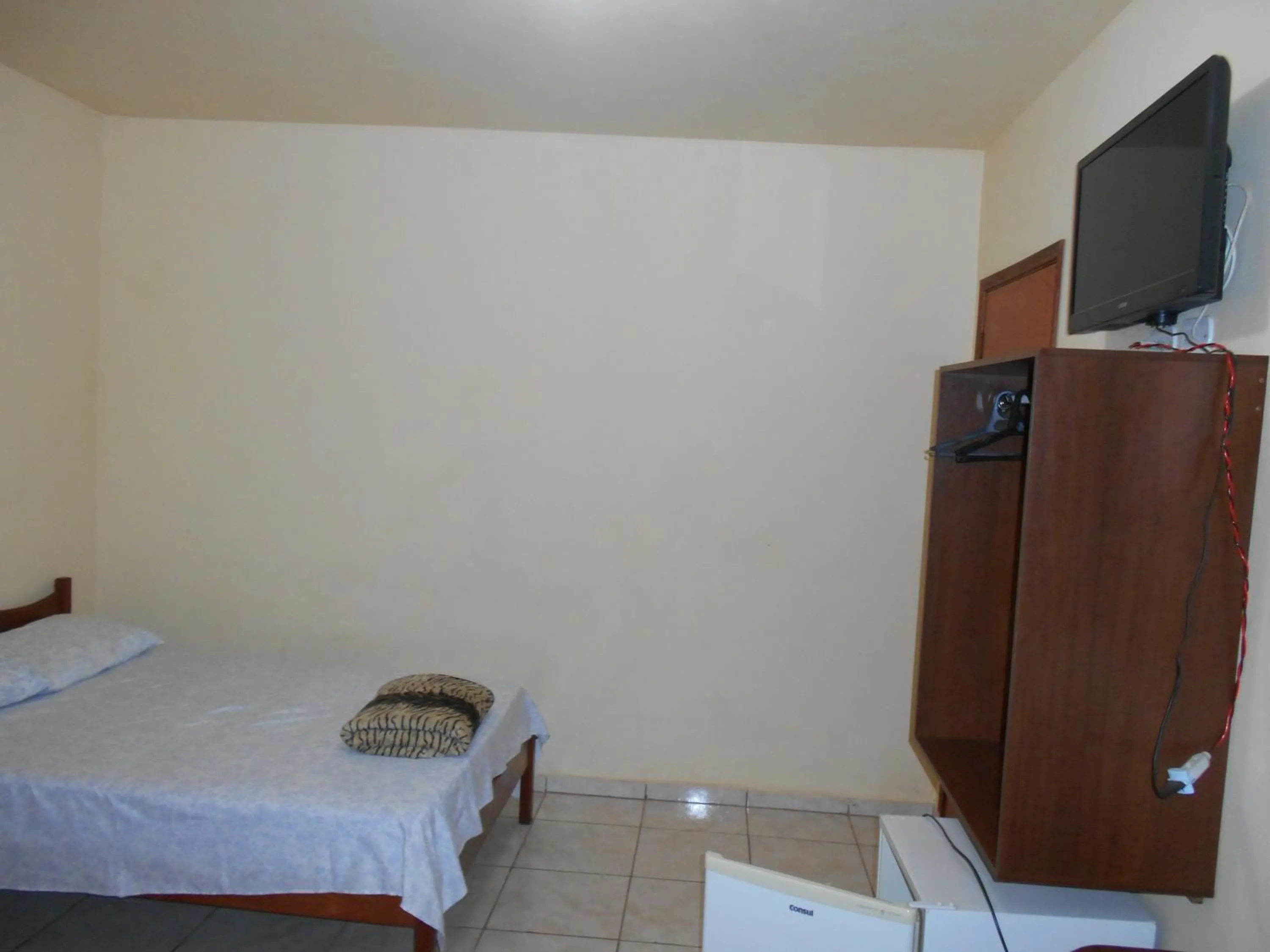 Bed in Pousada Paraiso