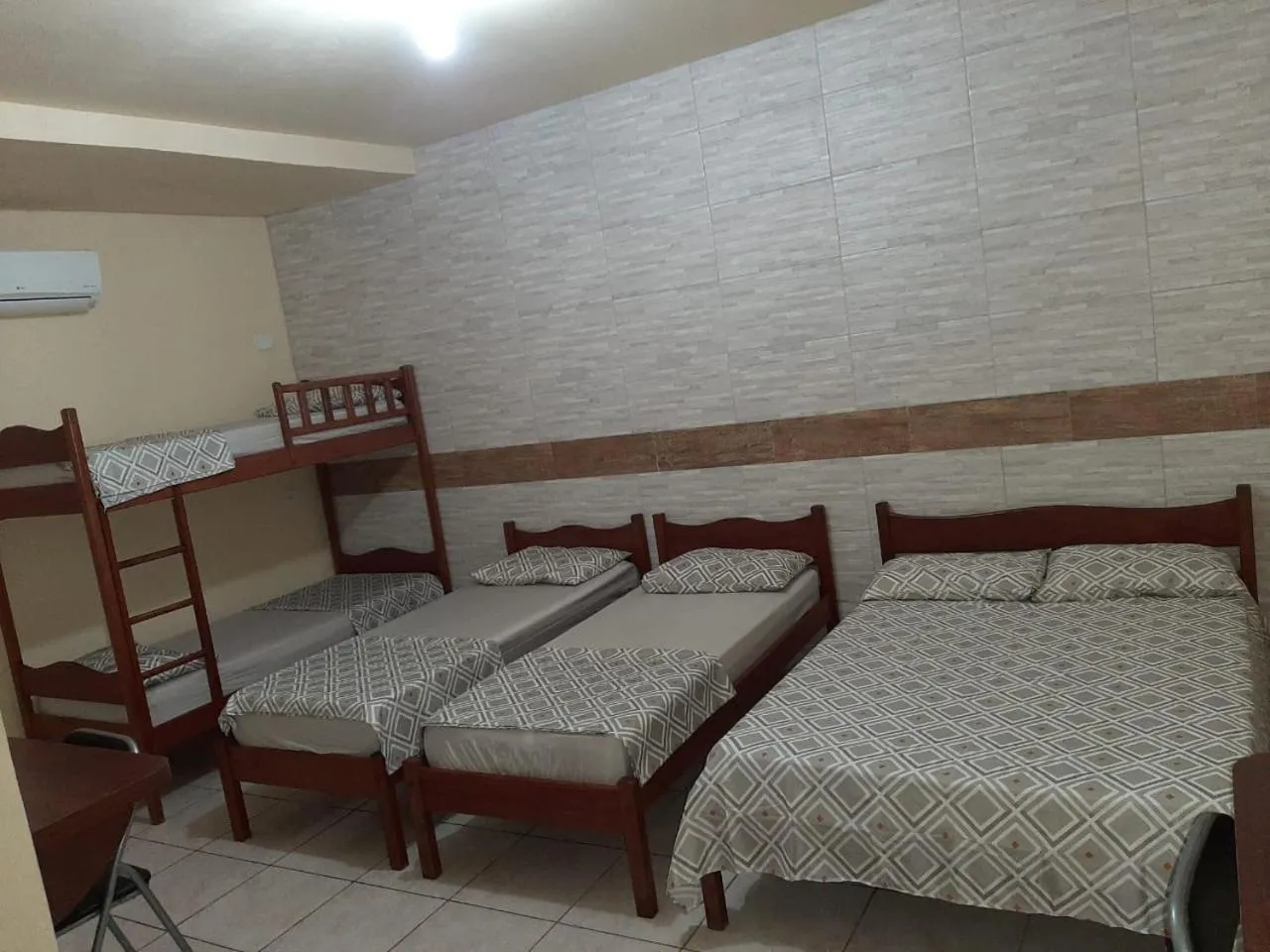 Bed in Pousada Paraiso