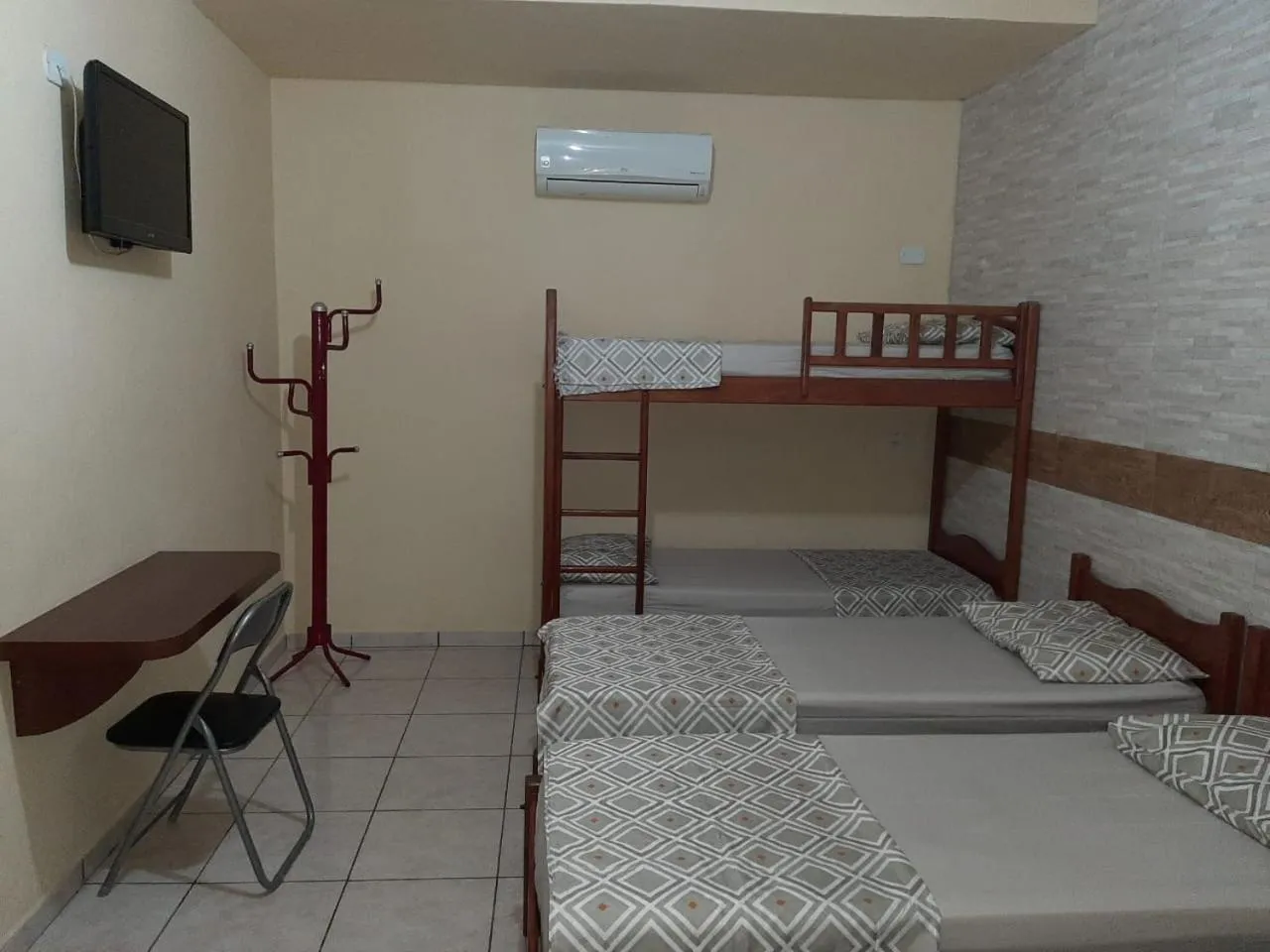 Bed in Pousada Paraiso