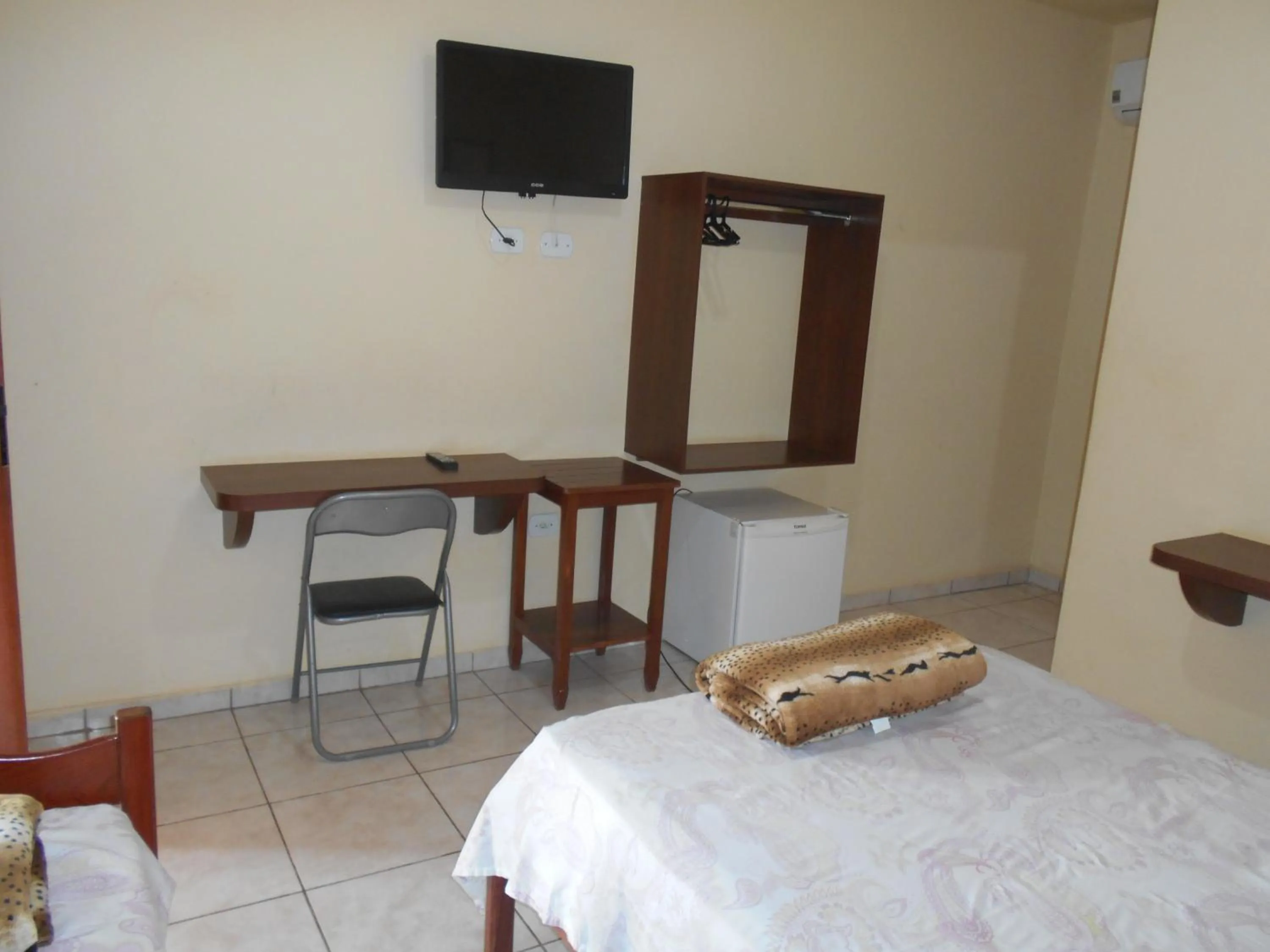 Bed in Pousada Paraiso