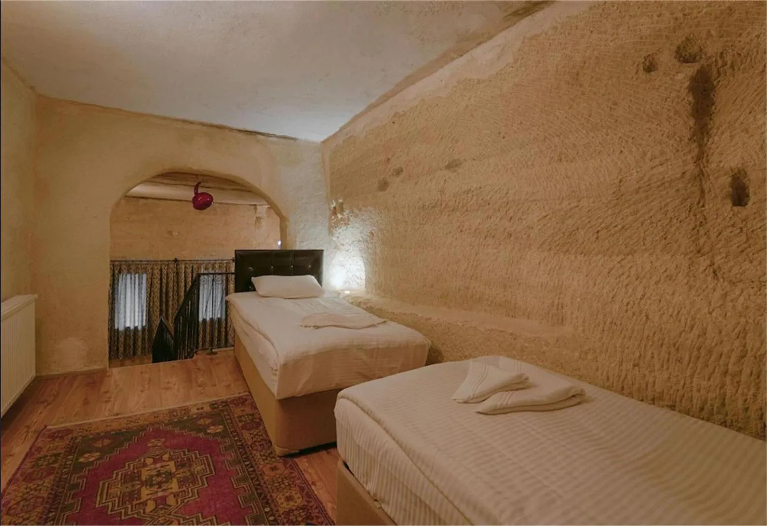 Bed in Avlu Cave House