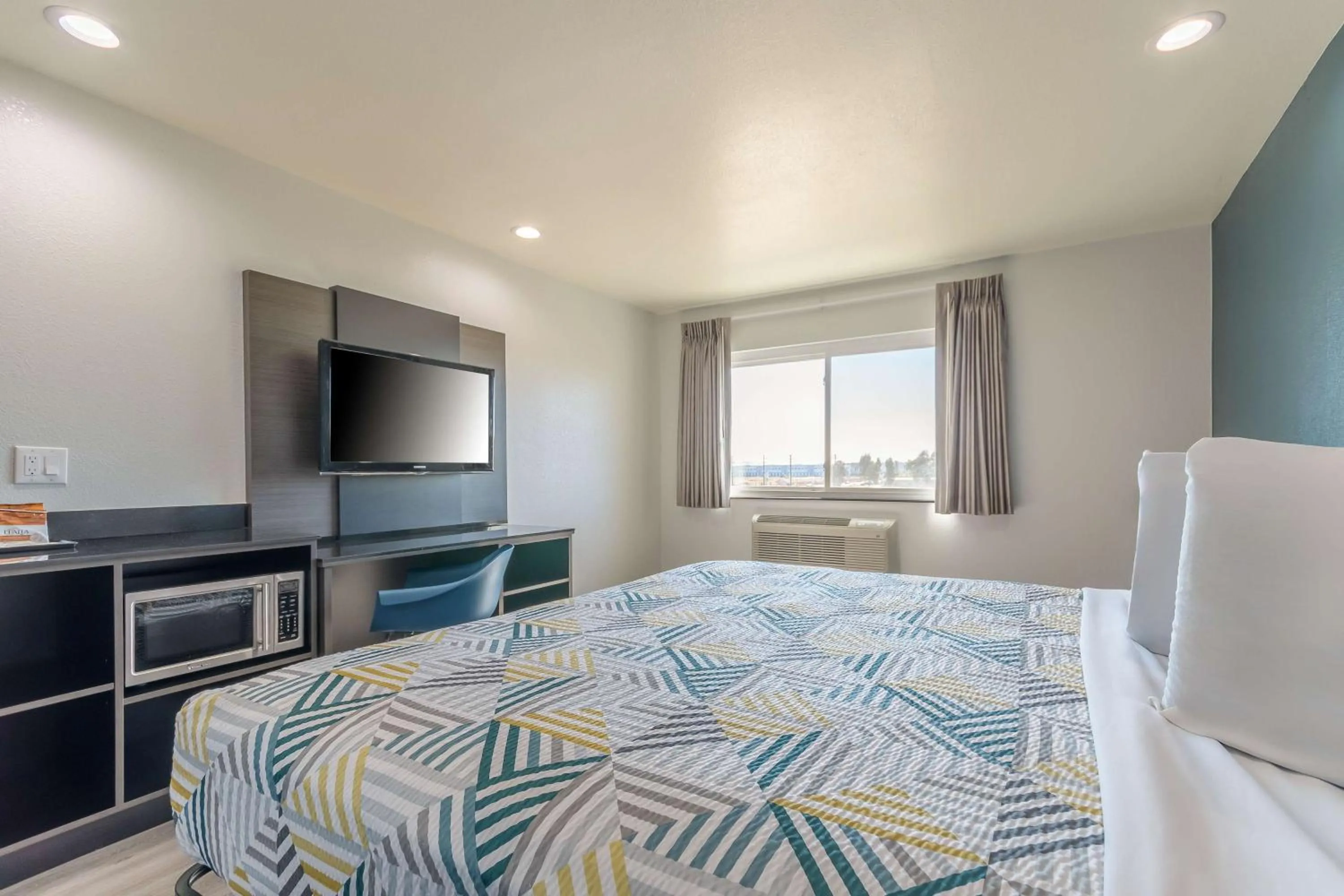 Bedroom, Bed in Studio 6 Suites Perris, CA