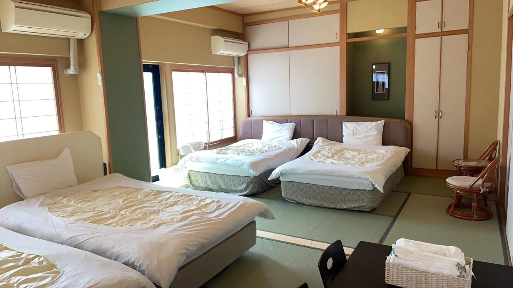 Bed in Minshuku Inn Shirahama Ekinoyado