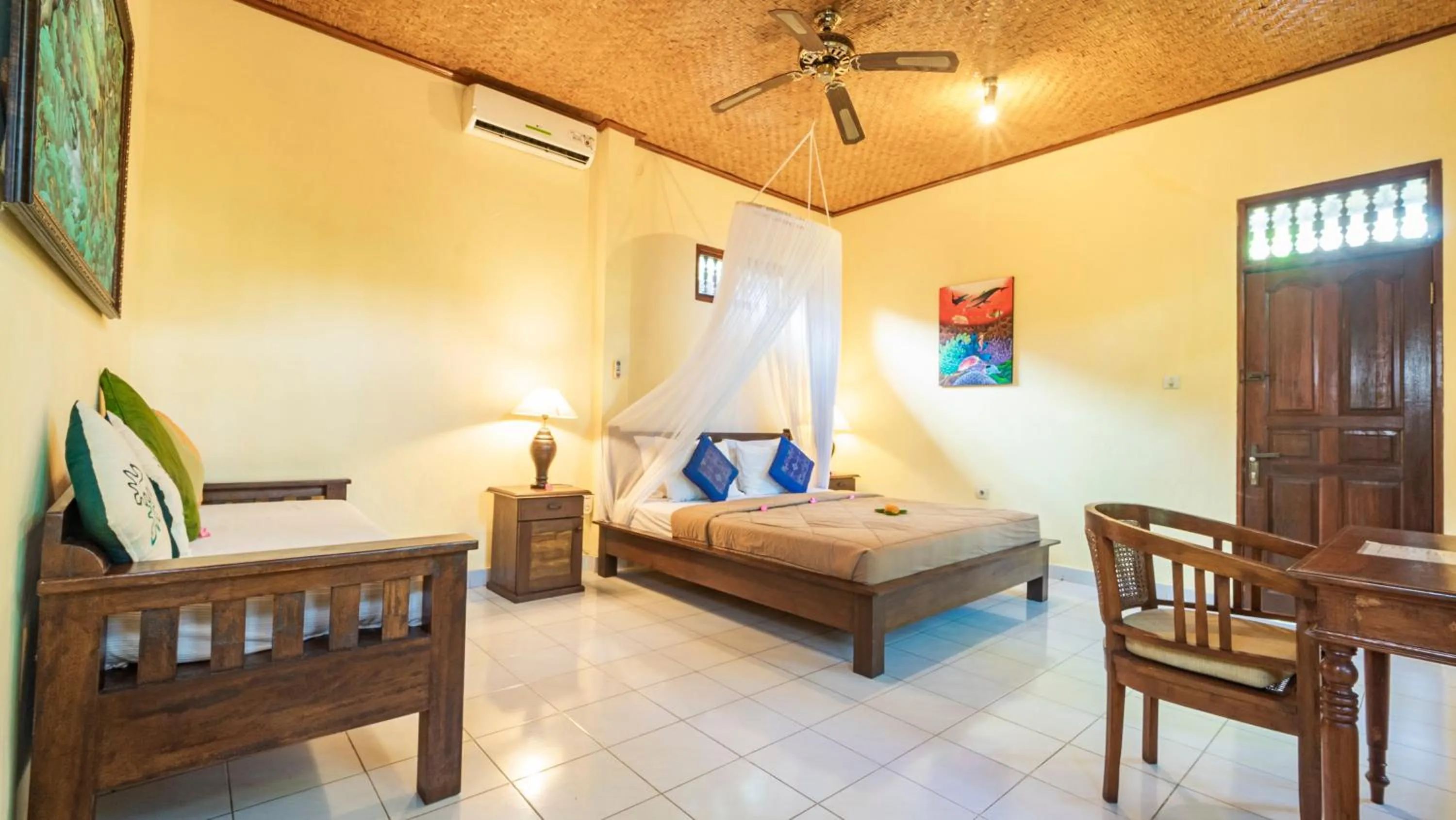 Bed in Cafe Wayan Cottages Senggigi