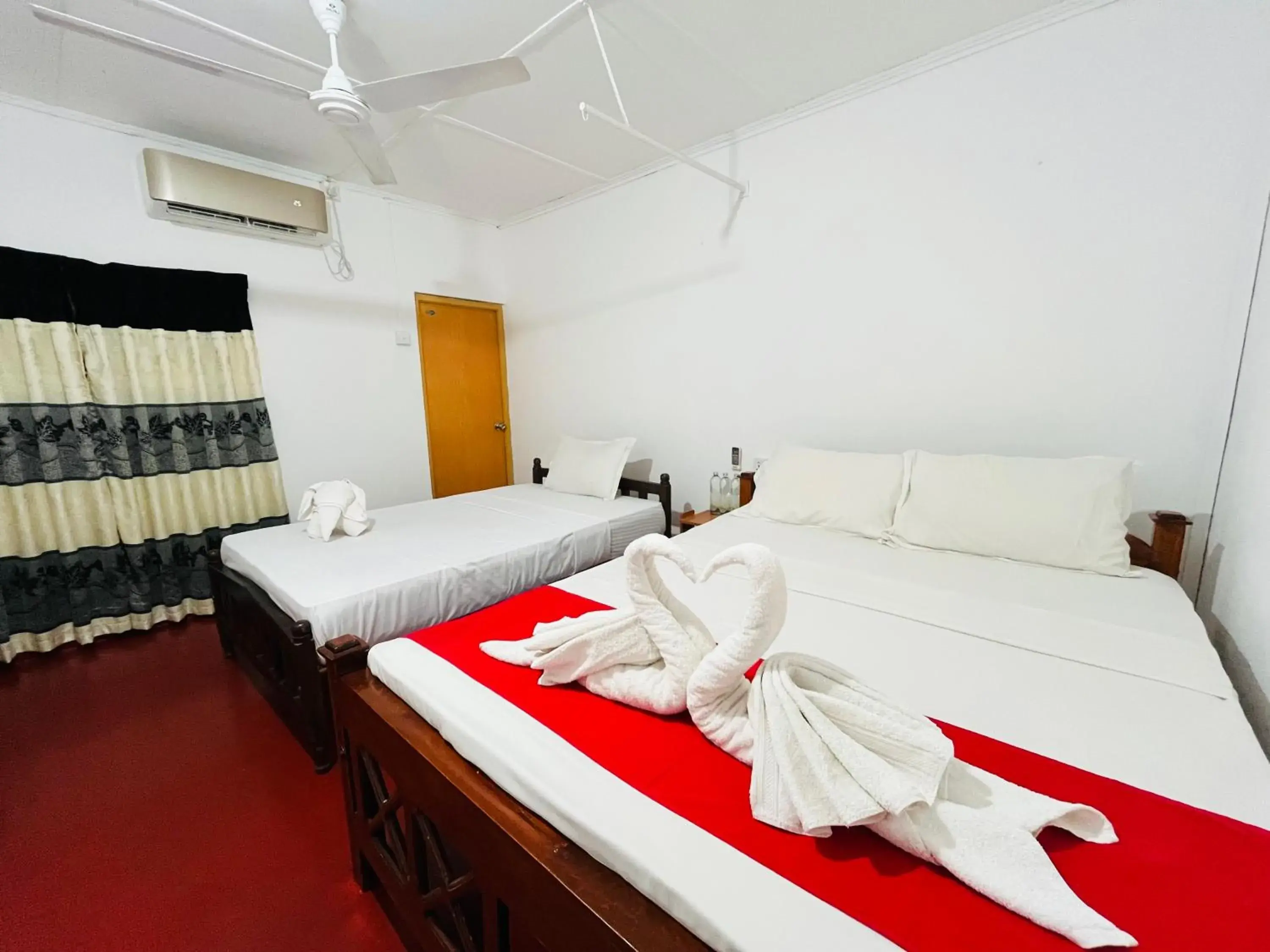 Standard Triple Room in Palitha Homestay Standard Triple Room in Palitha Homestay