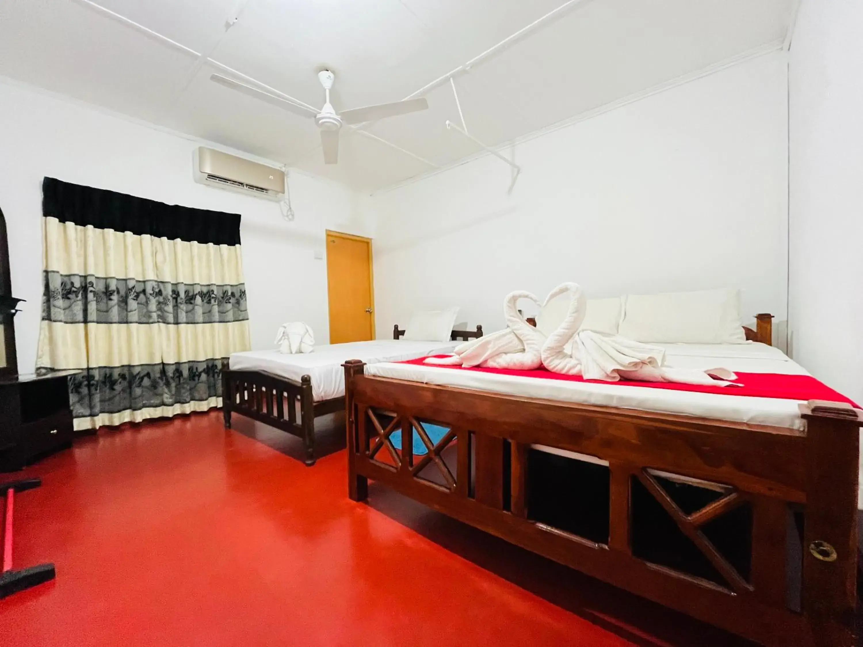 Standard Triple Room in Palitha Homestay Standard Triple Room in Palitha Homestay