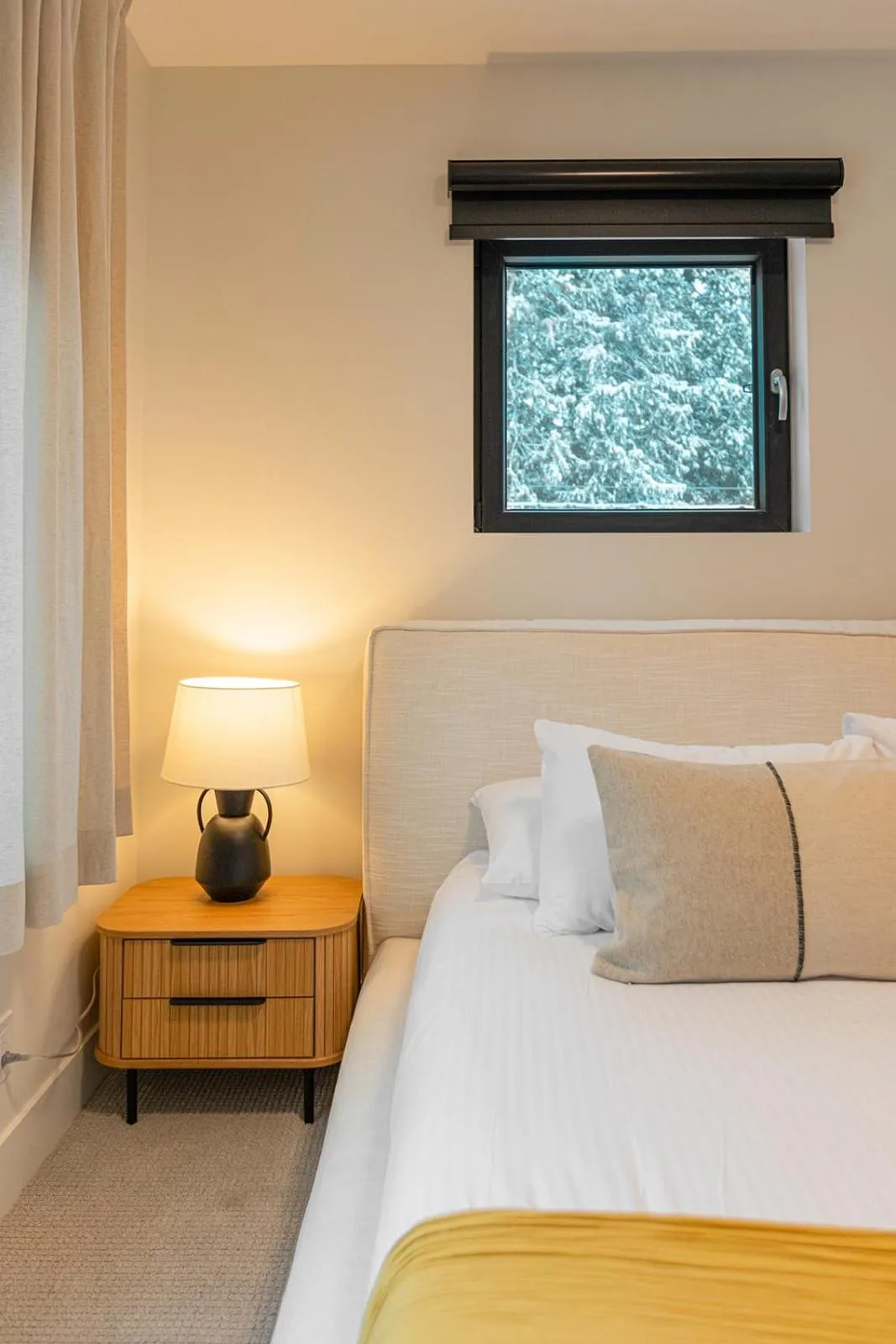 Bed in Tally Ho by Revelstoke Vacations