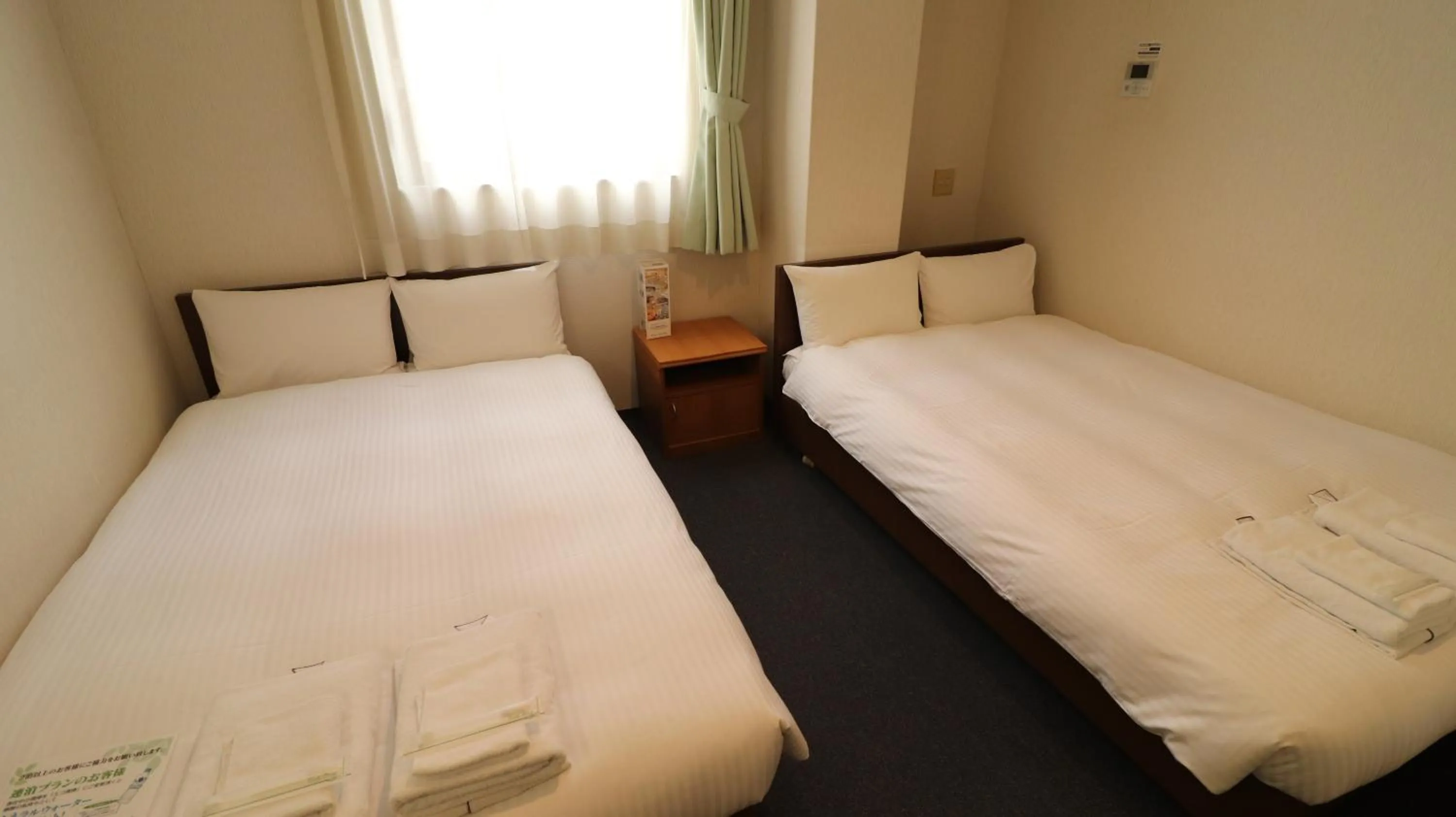 Bed in Hotel Green Arbor