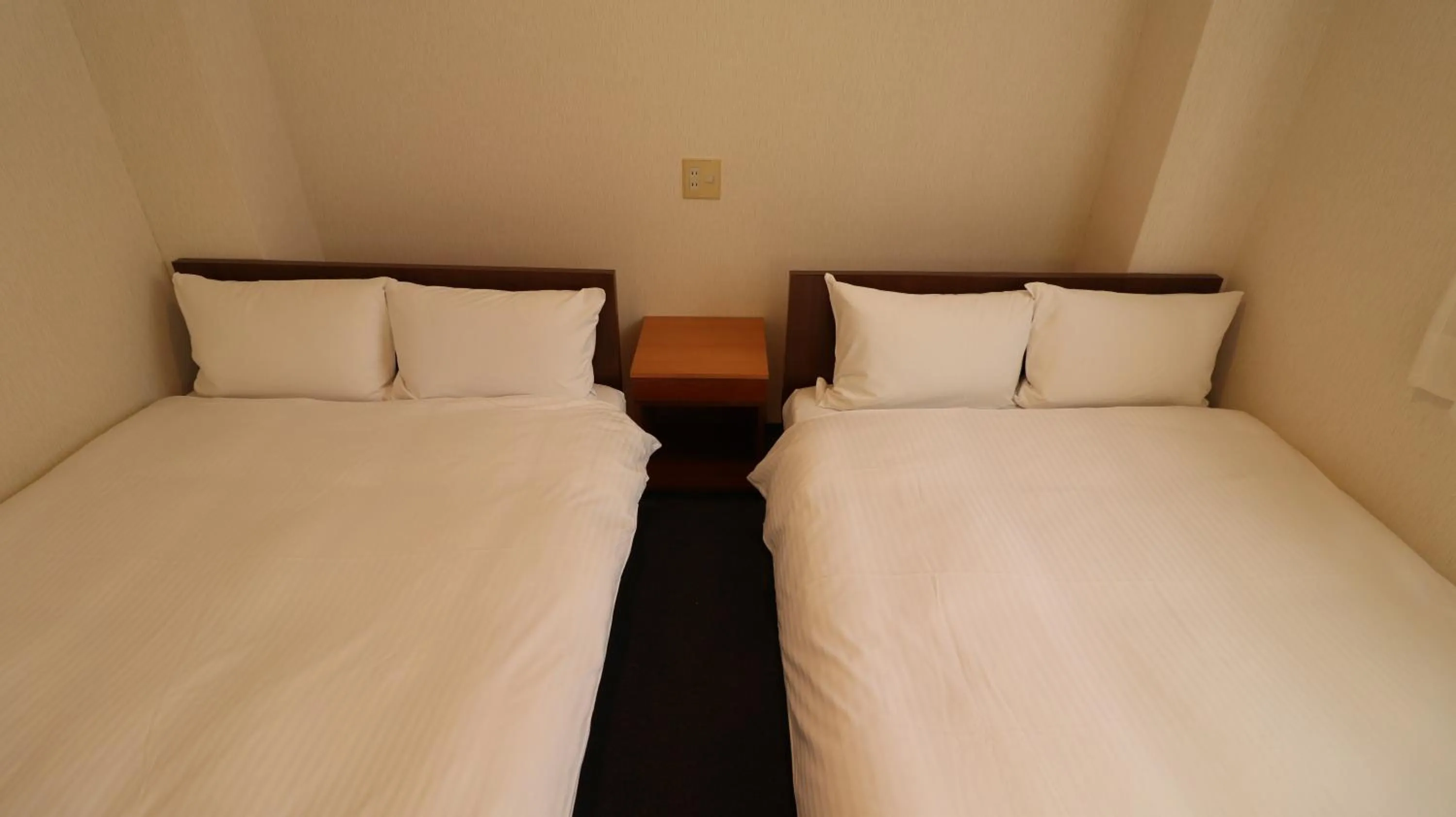 Bed in Hotel Green Arbor