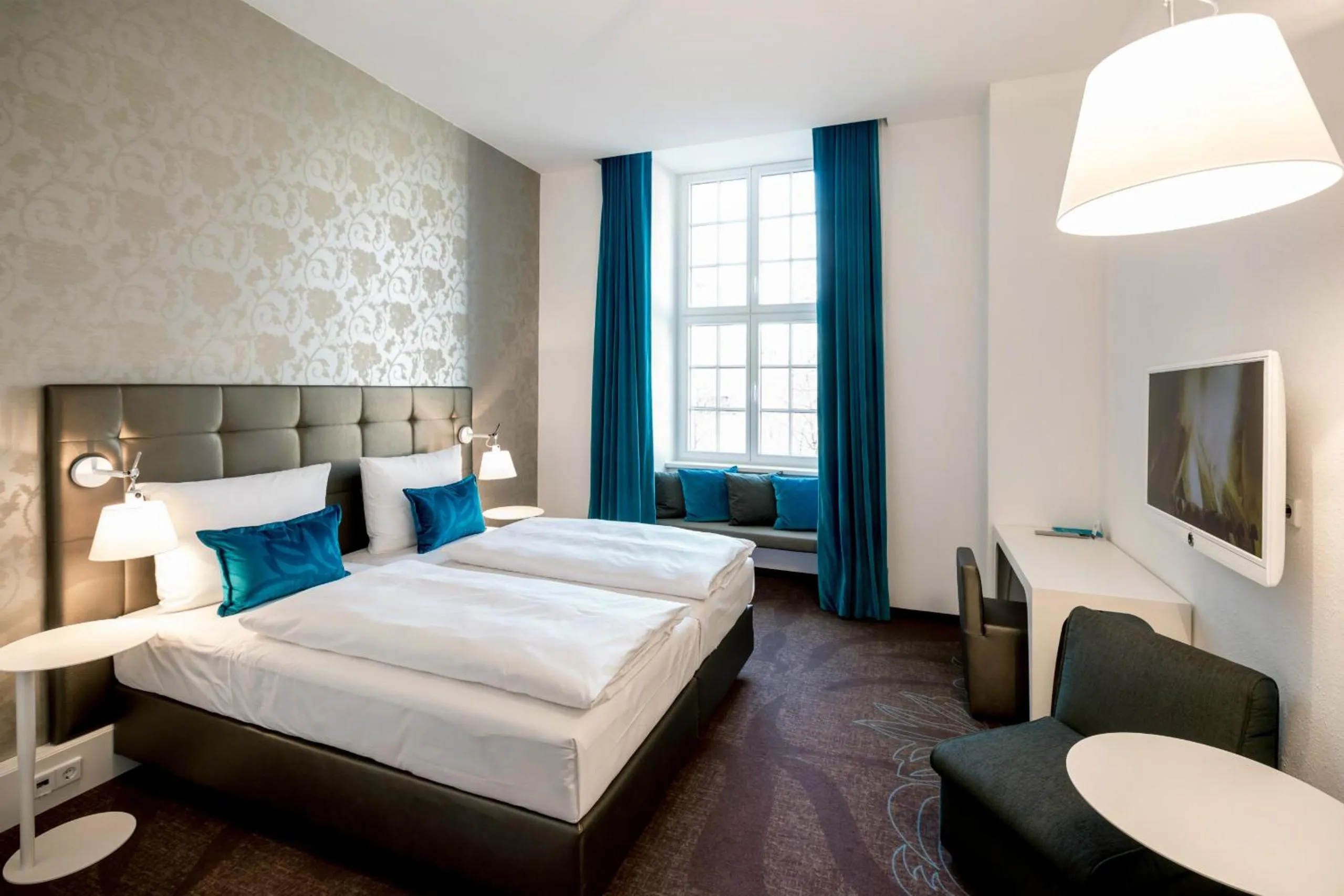 Photo of the whole room, Bed in Motel One Magdeburg