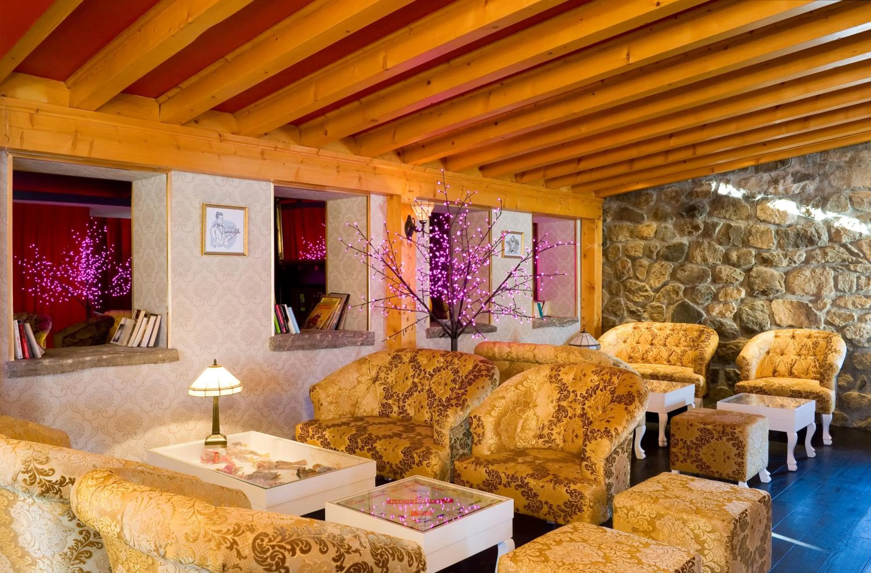 Communal lounge/ TV room in Madame Vacances Hôtel et Spa Ibiza