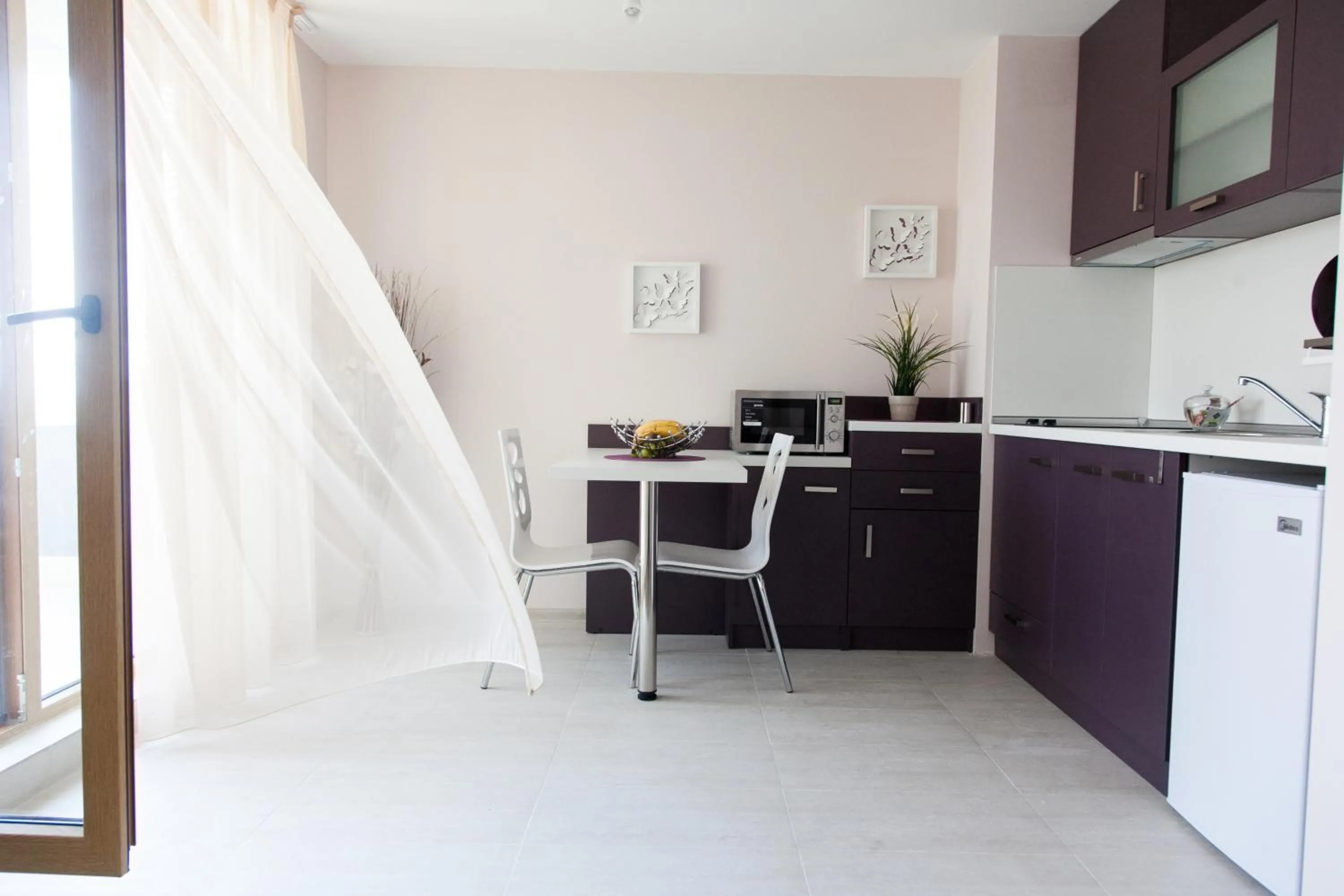 Kitchen or kitchenette in Sky Apartments