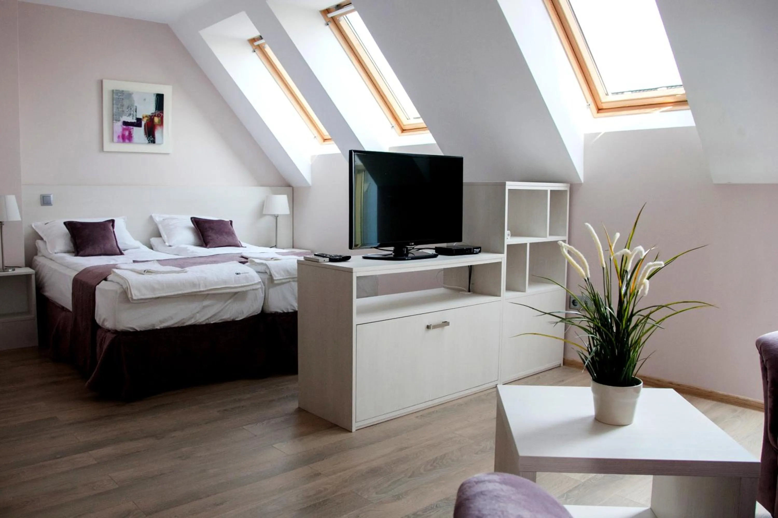 Photo of the whole room, Bed in Sky Apartments