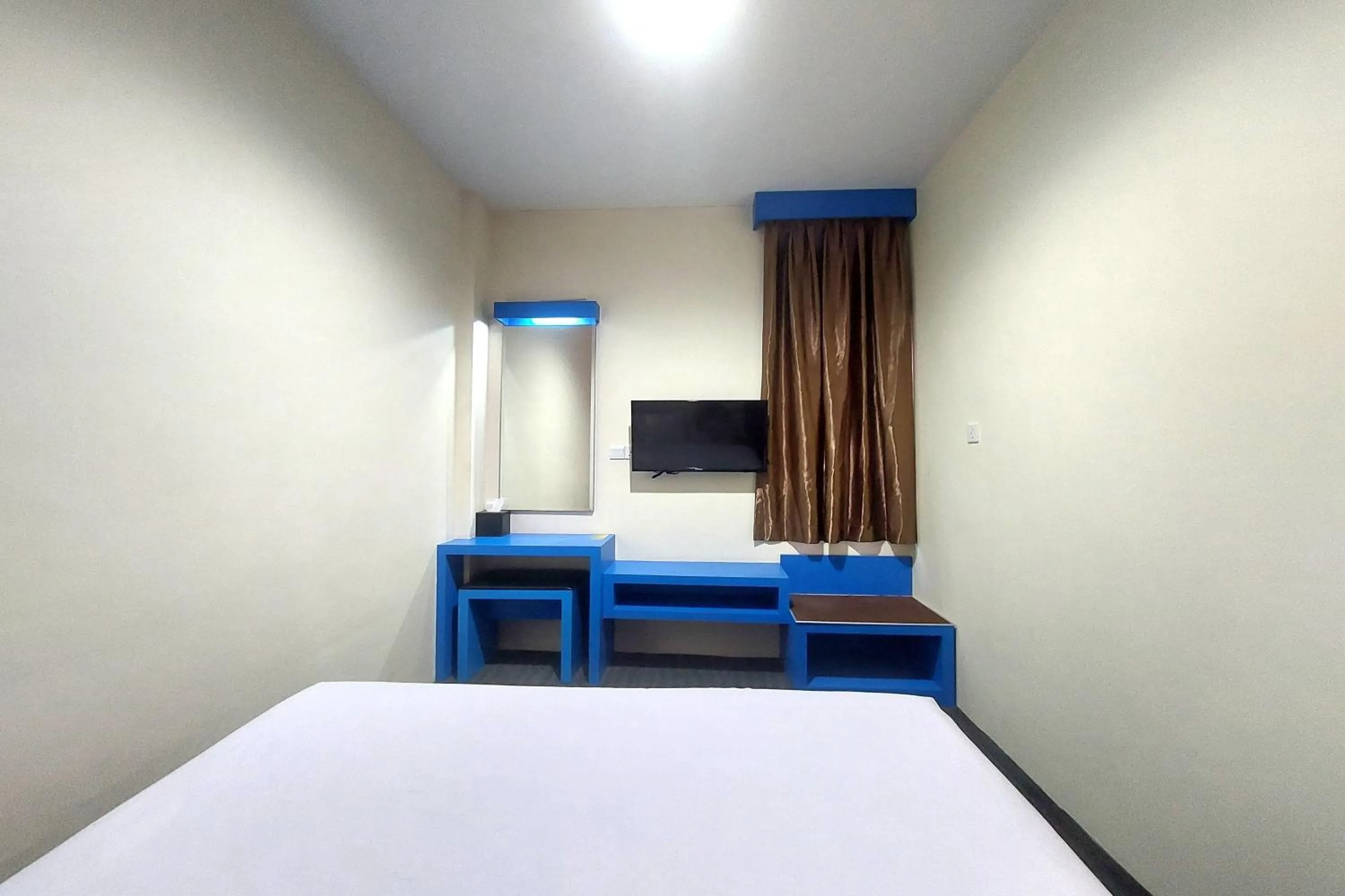 Photo of the whole room in D'MERLION HOTEL