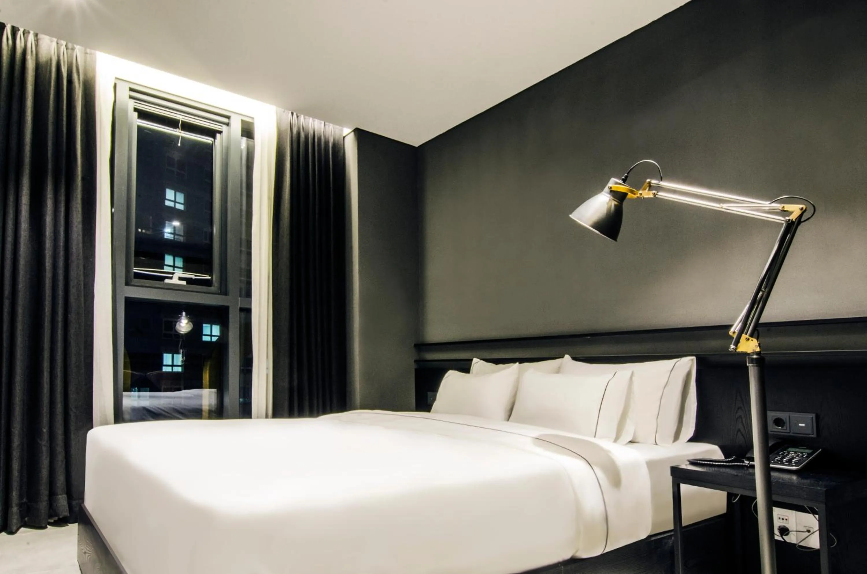 Bed in Hotel The Designers Premier Kondae