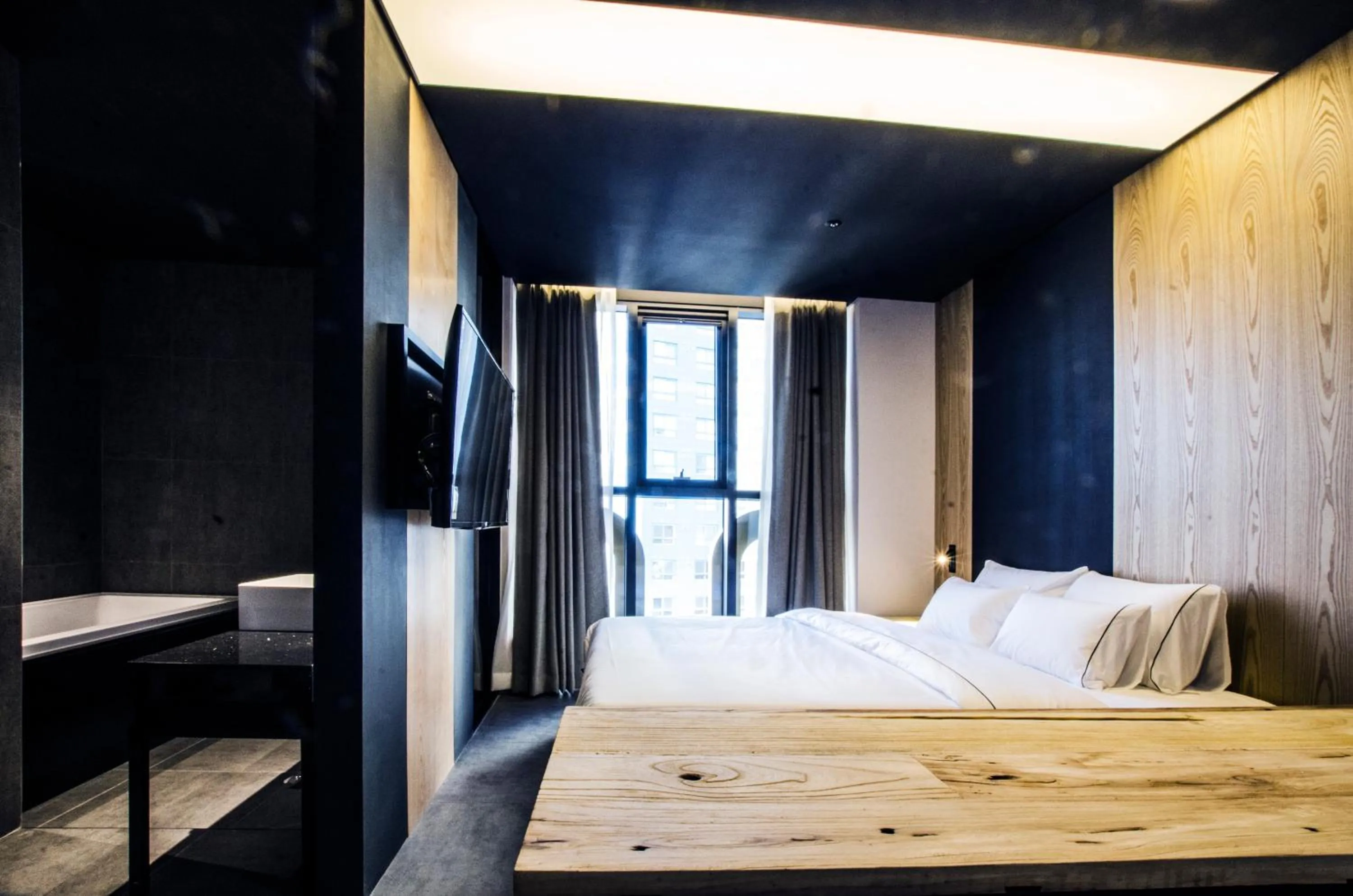 Bed in Hotel The Designers Premier Kondae