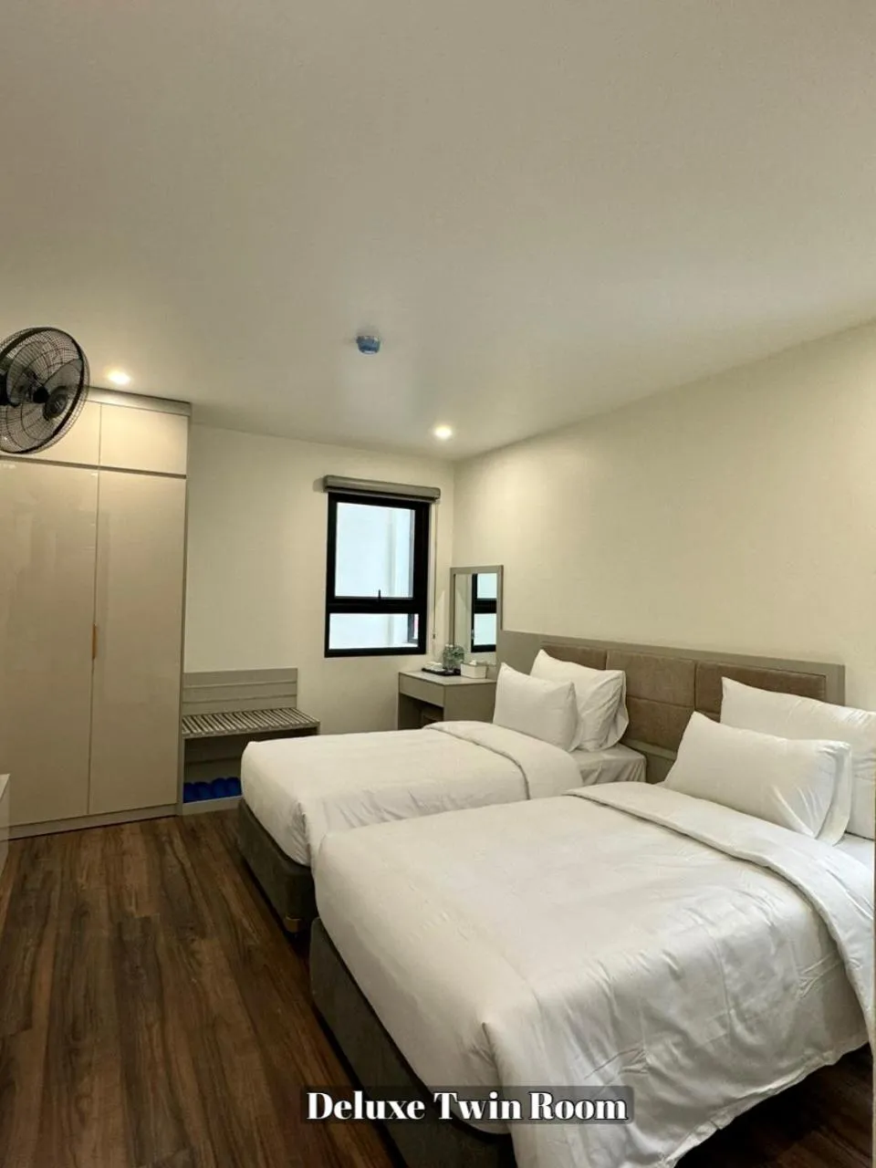 Bed in Grand Dragon Noi Bai Hotel